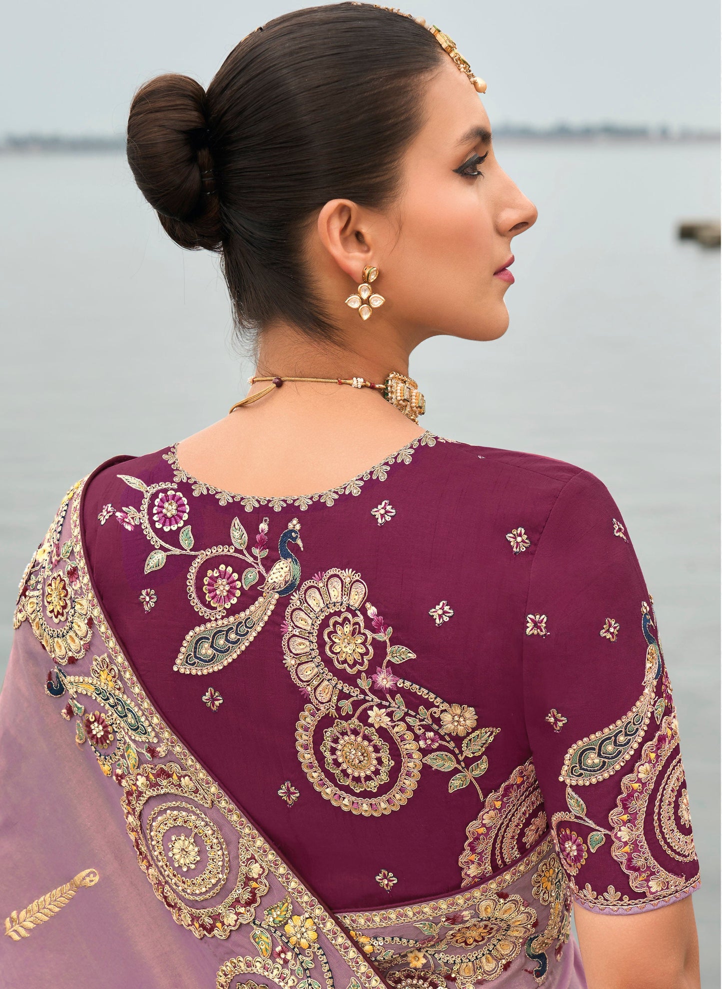 Lavender Gadwal silk saree with magenta blouse and embroidery.
