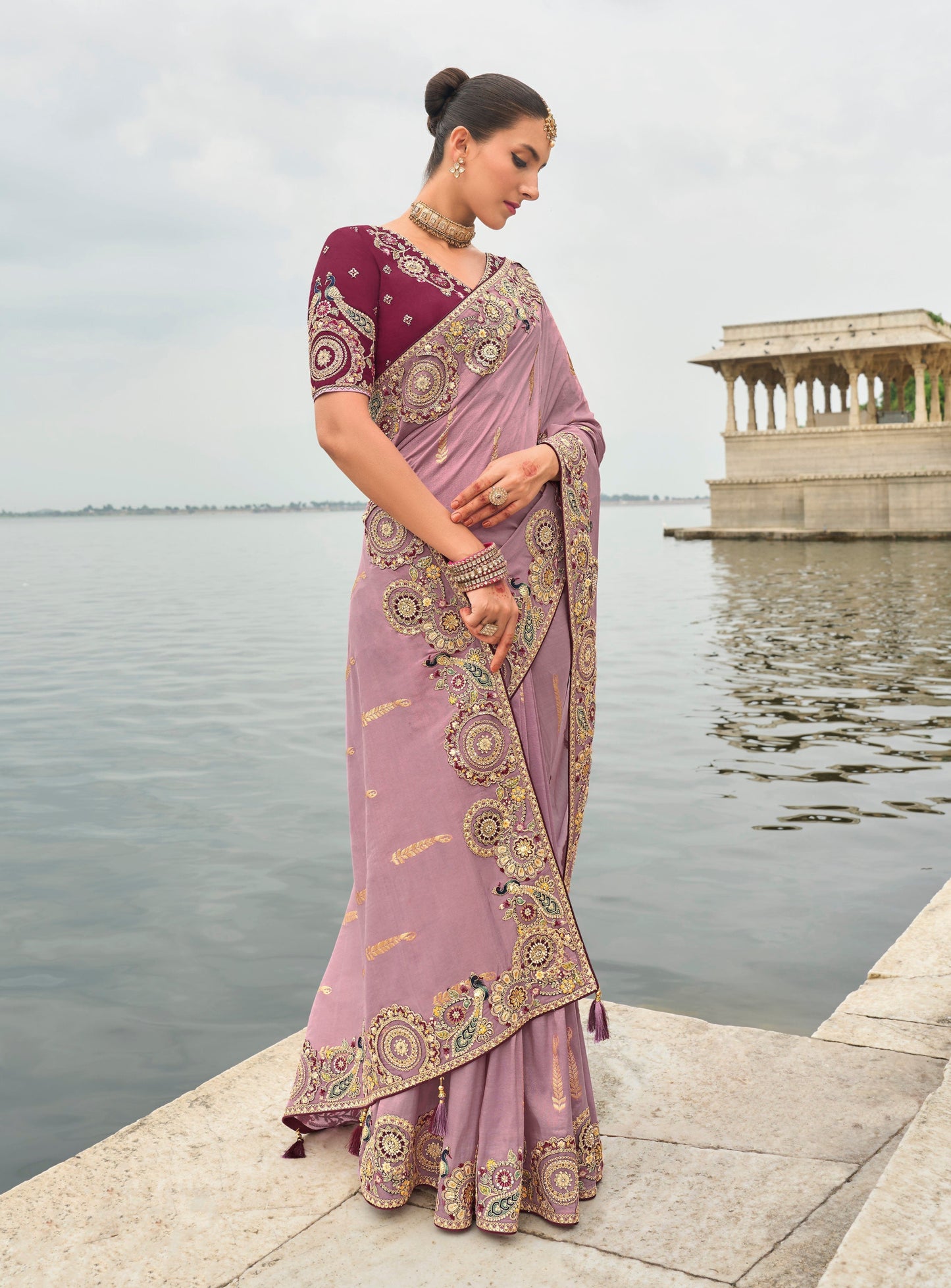 Lavender Gadwal silk saree with magenta blouse and embroidery.