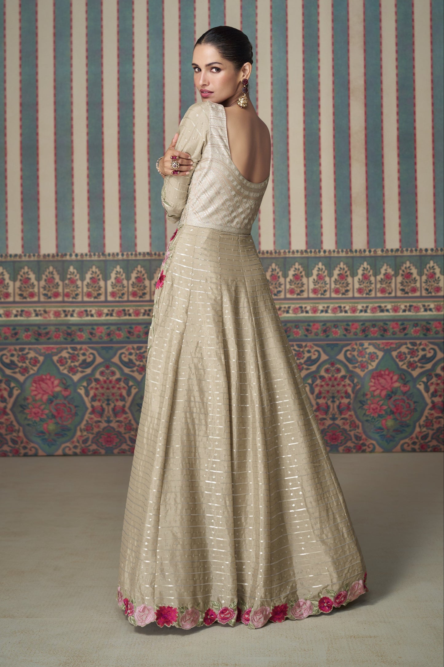 Beige Anarkali gown in Chinon silk with embroidery work, offering a soft, elegant look perfect for festive and special occasions.