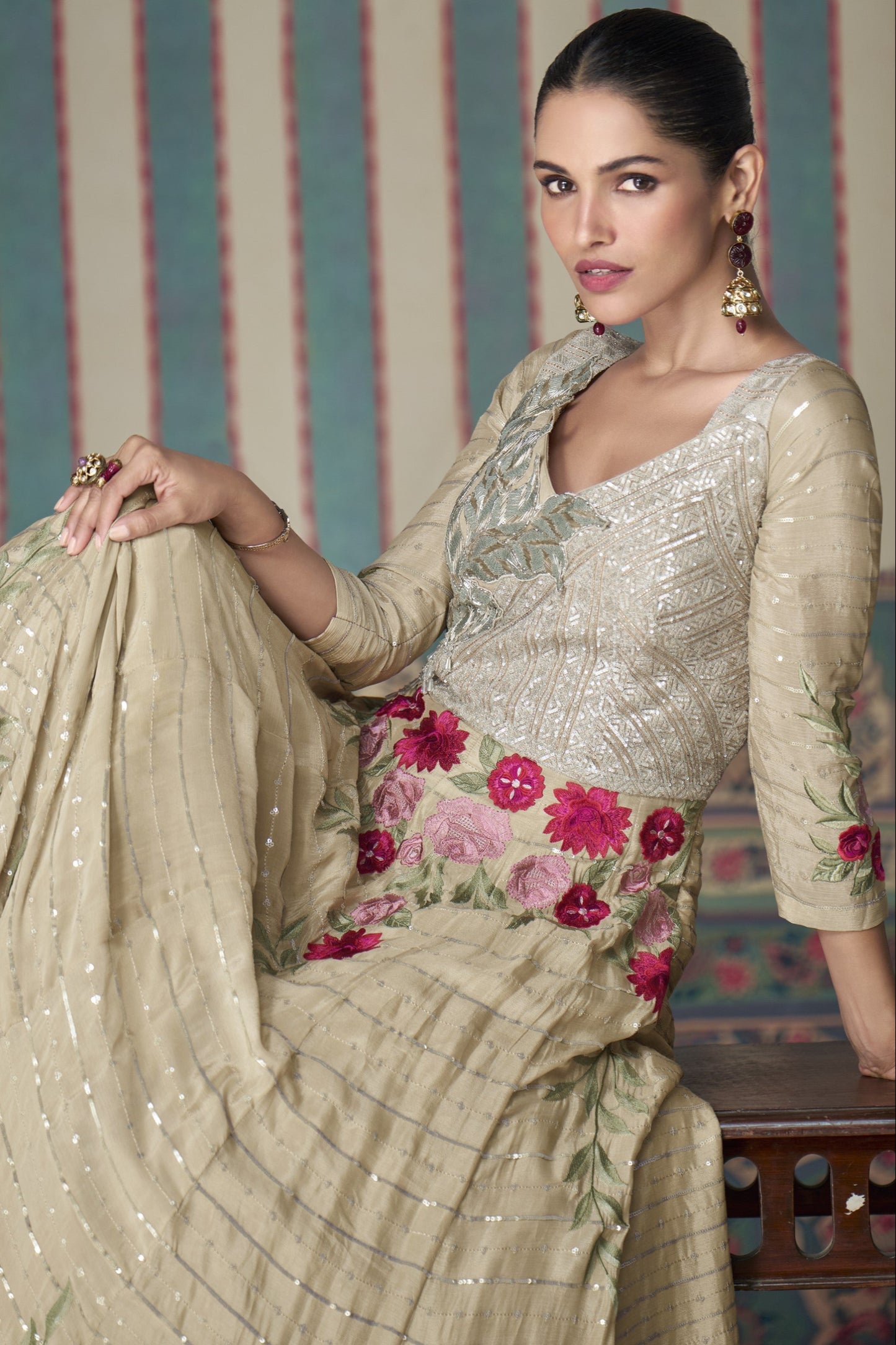 Beige Anarkali gown in Chinon silk with embroidery work, offering a soft, elegant look perfect for festive and special occasions.