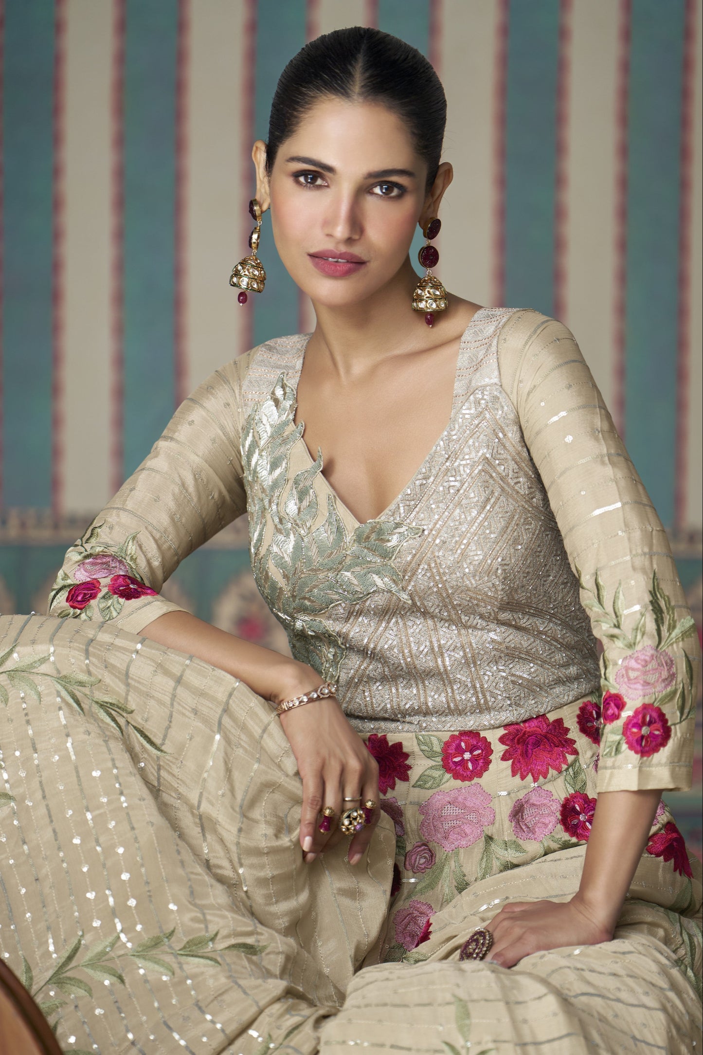 Beige Anarkali gown in Chinon silk with embroidery work, offering a soft, elegant look perfect for festive and special occasions.