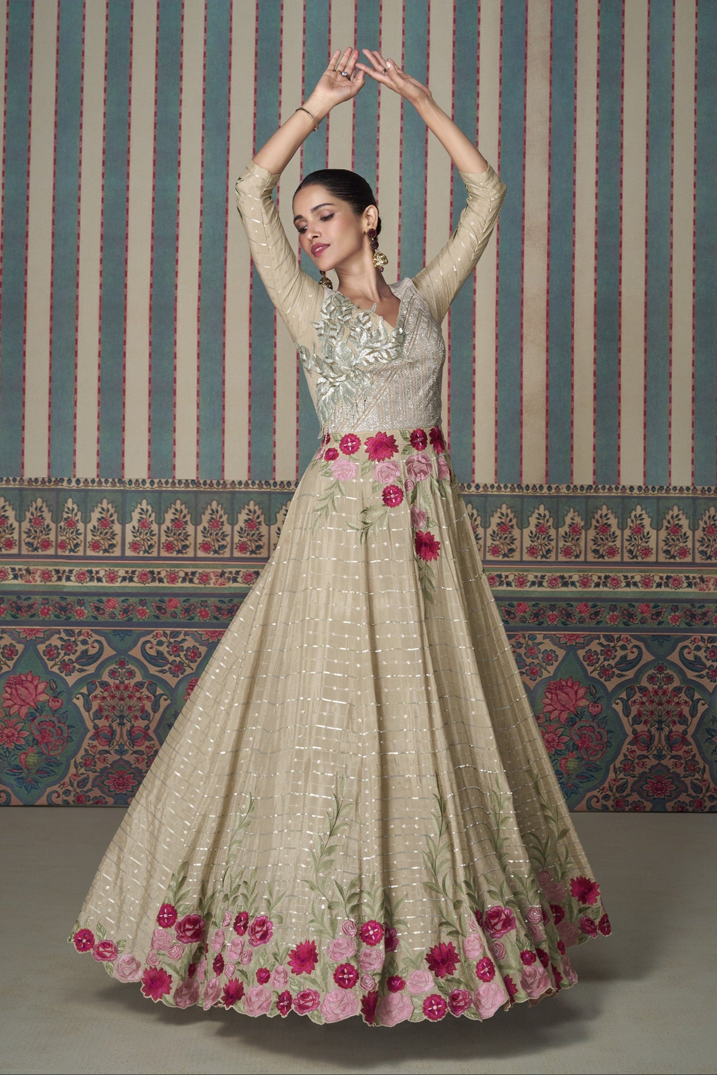 Beige Anarkali gown in Chinon silk with embroidery work, offering a soft, elegant look perfect for festive and special occasions.