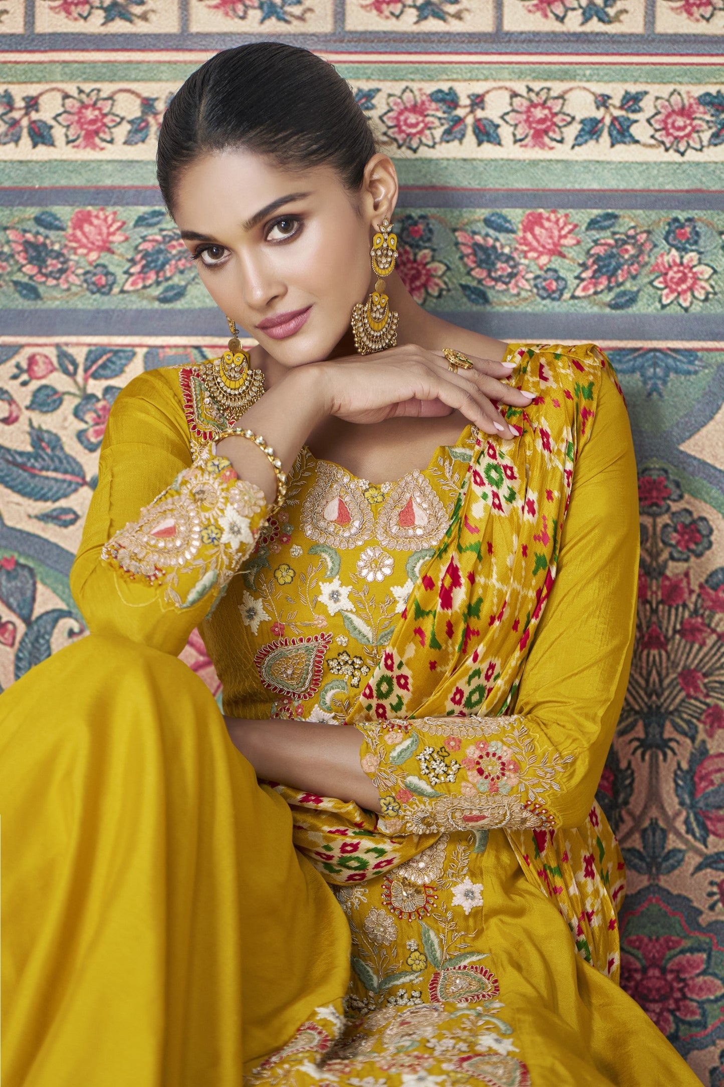 Yellow Anarkali gown in Chinon silk with embroidery work, bringing a bright and graceful charm to festive celebrations.