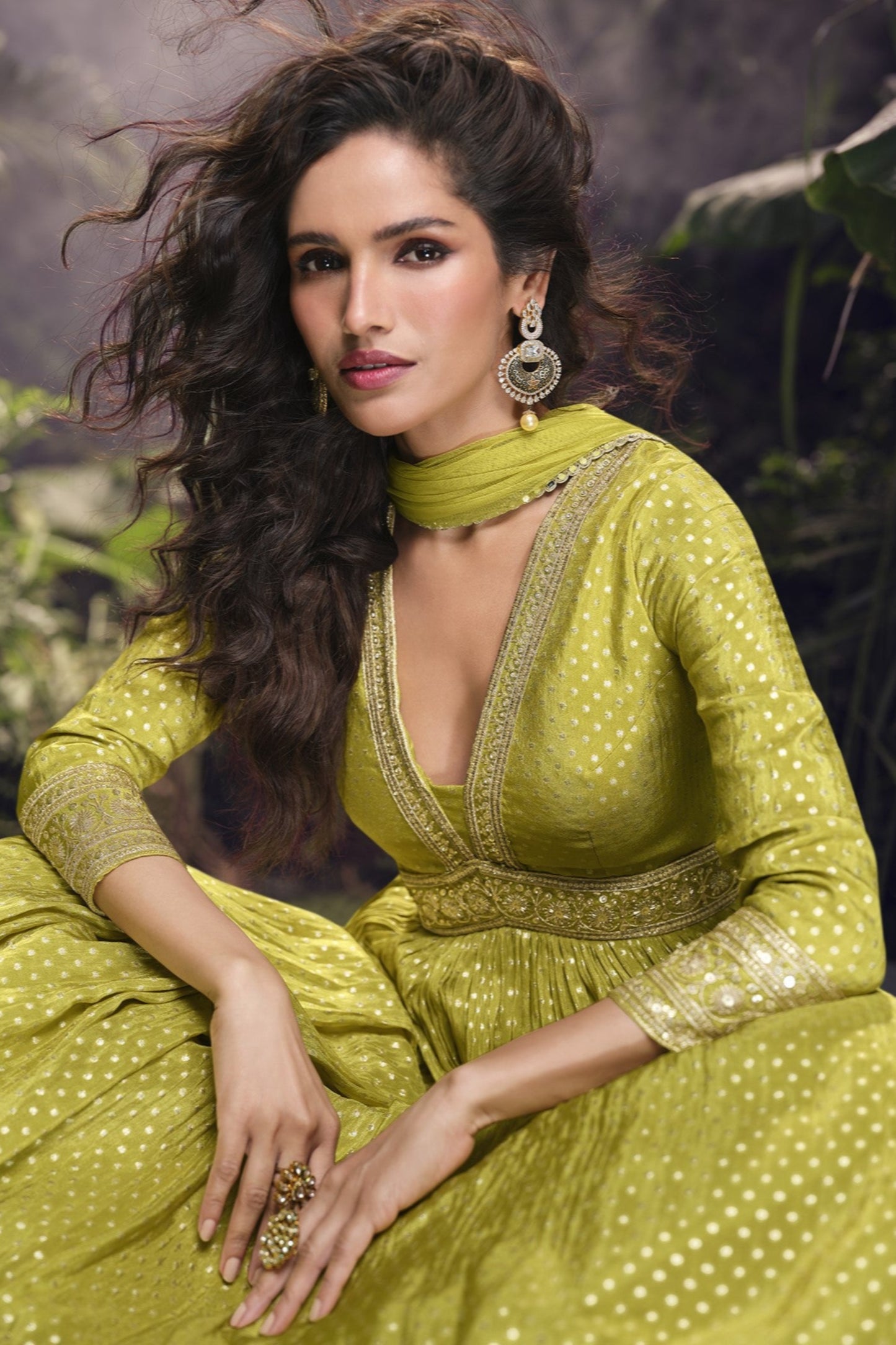 Yellow Anarkali gown in viscose jacquard silk with embroidery work, paired with a net dupatta to create a bright and elegant festive outfit.