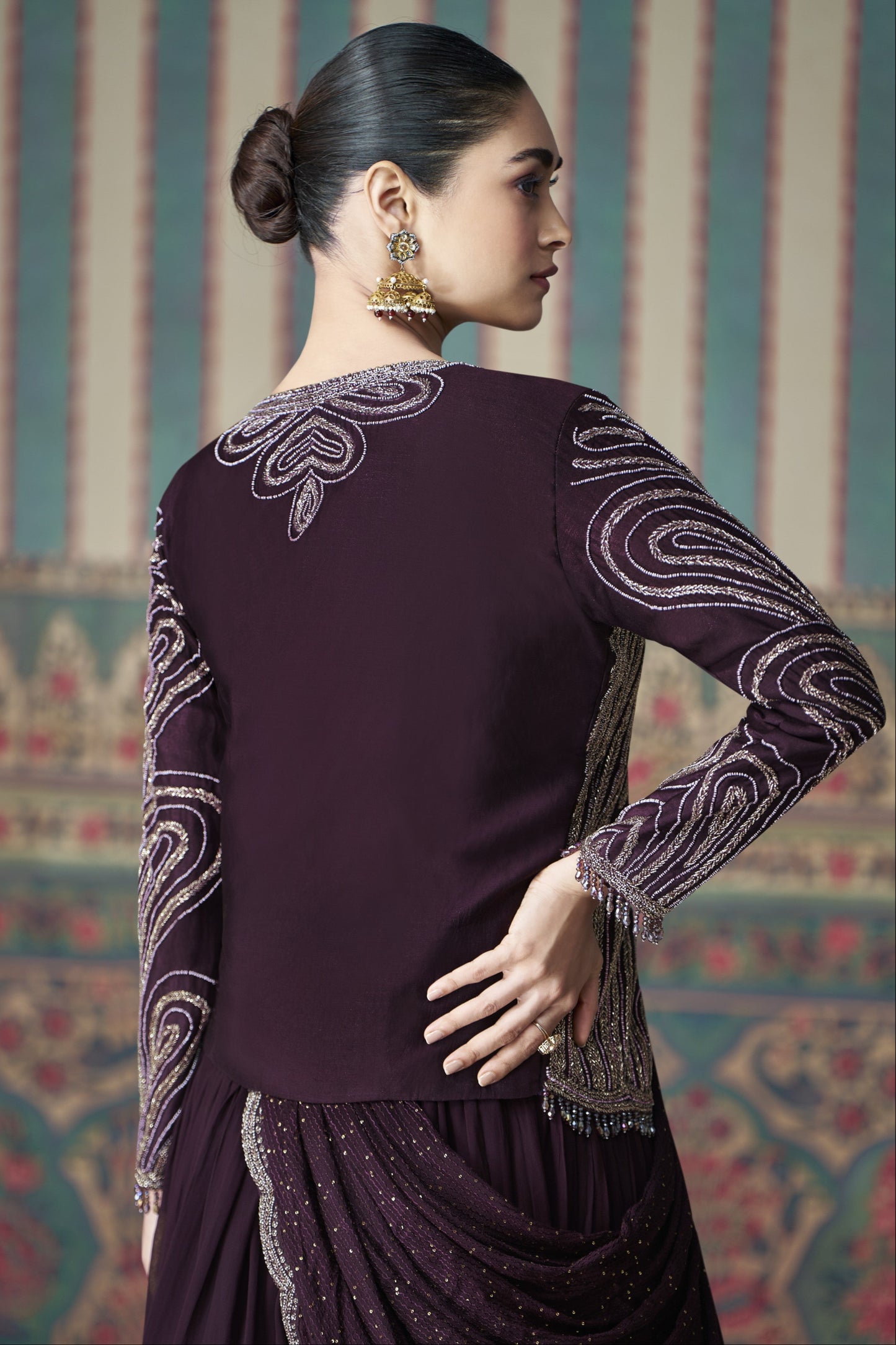 Wine Anarkali gown in Chinon silk with embroidery work, exuding rich elegance perfect for weddings and festive occasions.