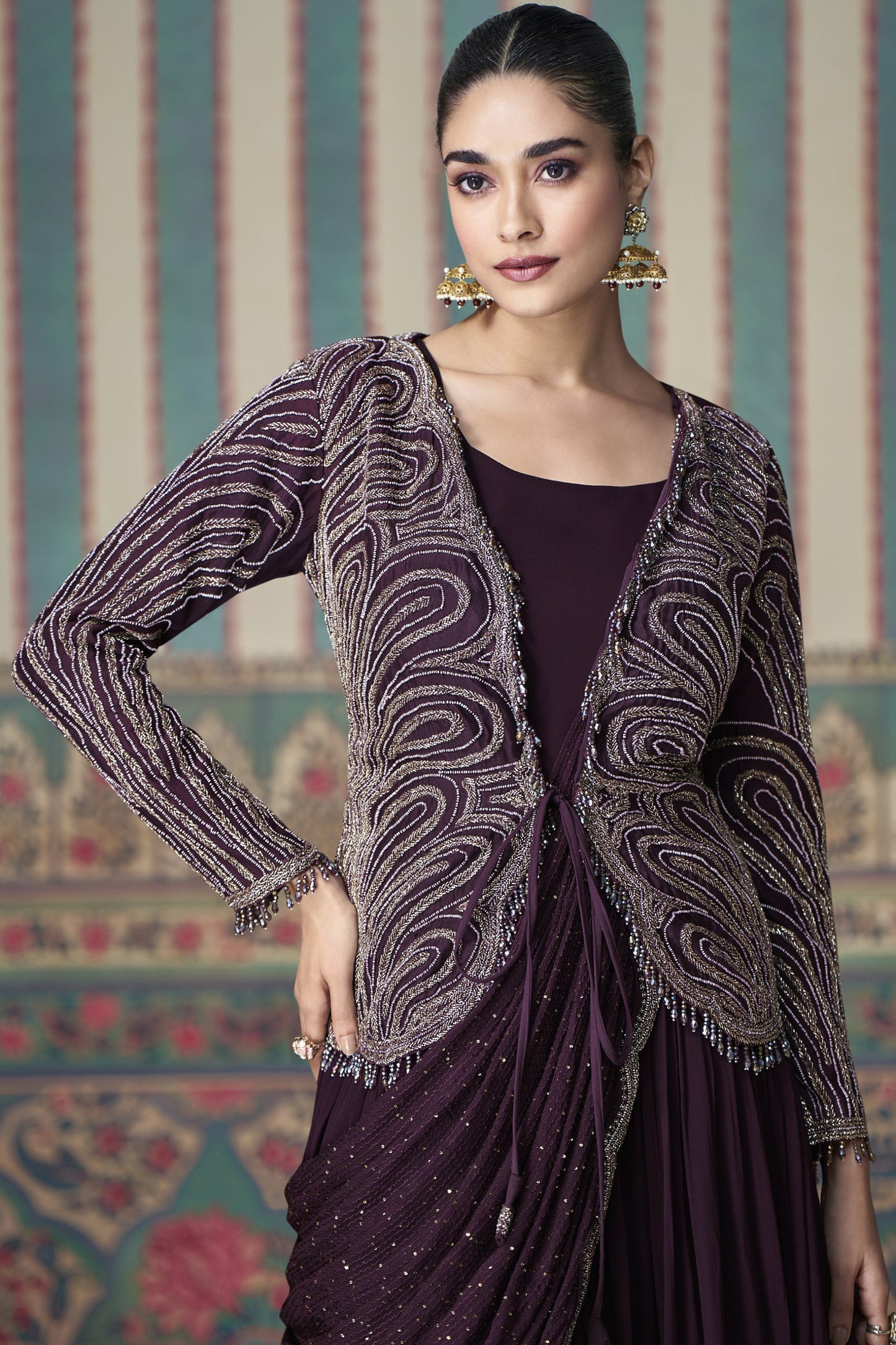 Wine Anarkali gown in Chinon silk with embroidery work, exuding rich elegance perfect for weddings and festive occasions.
