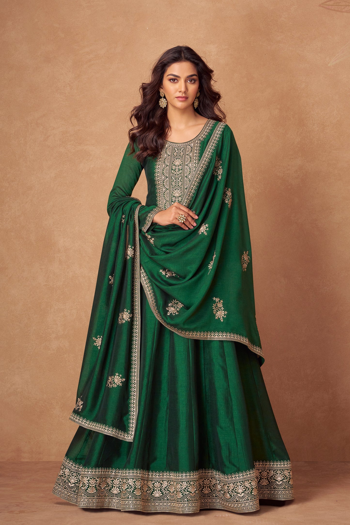 Dark green Anarkali gown offers a regal and graceful look, ideal for evening events, festive occasions, or weddings.