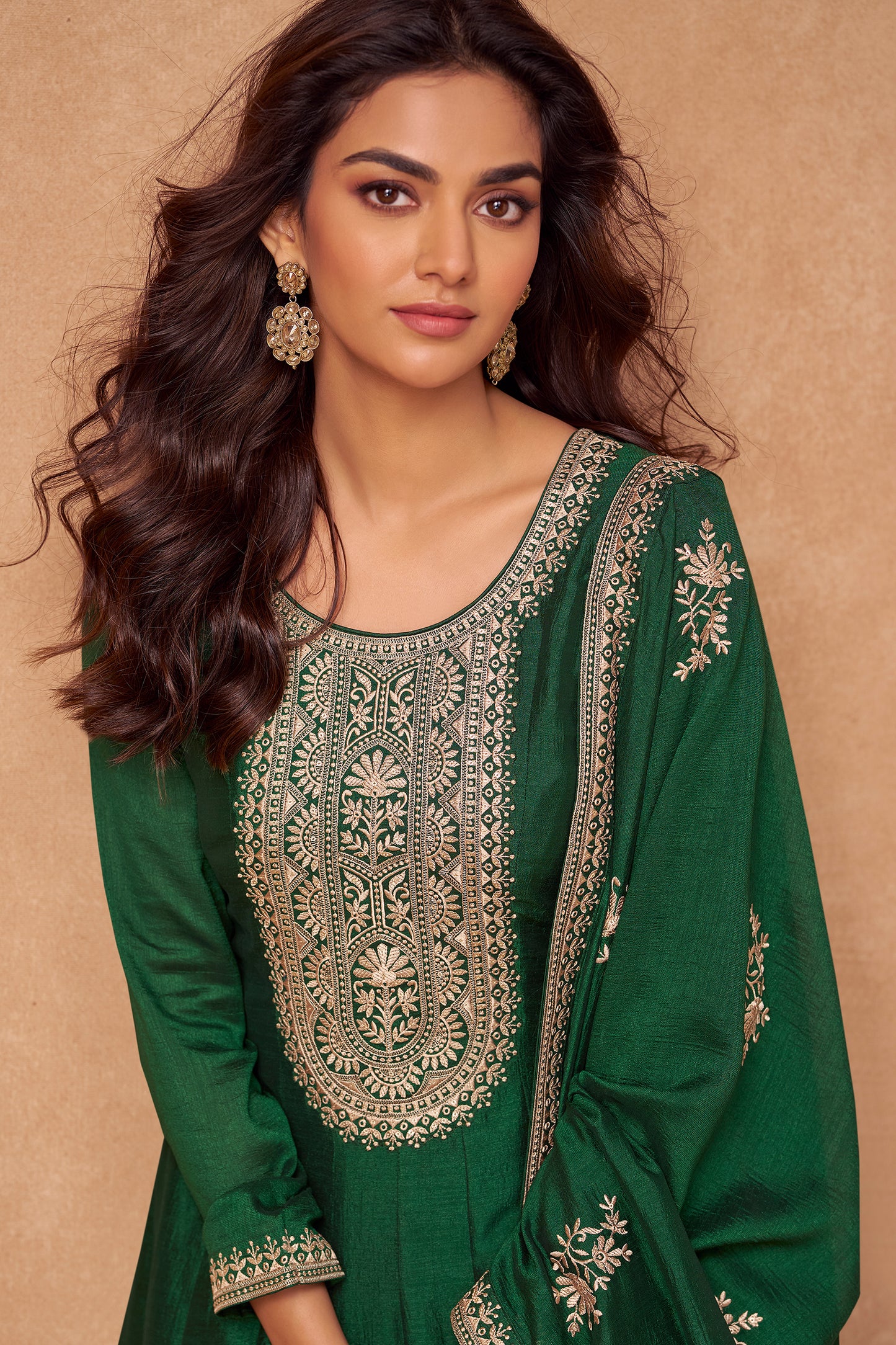 Dark green Anarkali gown offers a regal and graceful look, ideal for evening events, festive occasions, or weddings.