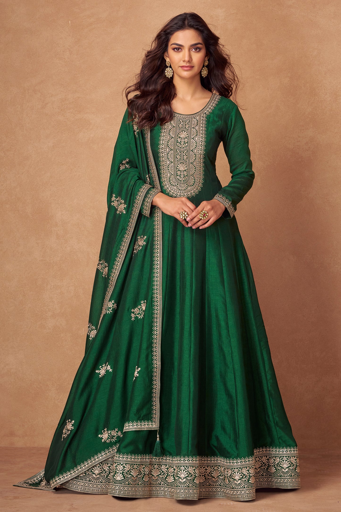 Dark green Anarkali gown offers a regal and graceful look, ideal for evening events, festive occasions, or weddings.