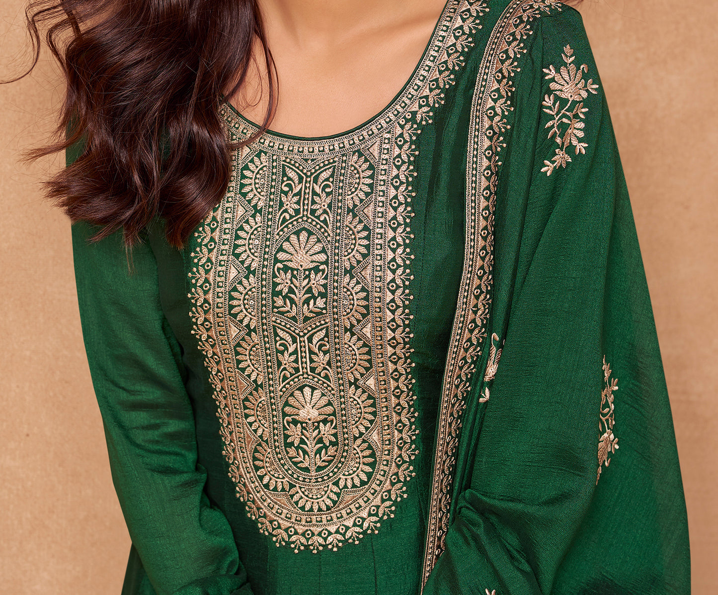 Dark green Anarkali gown offers a regal and graceful look, ideal for evening events, festive occasions, or weddings.
