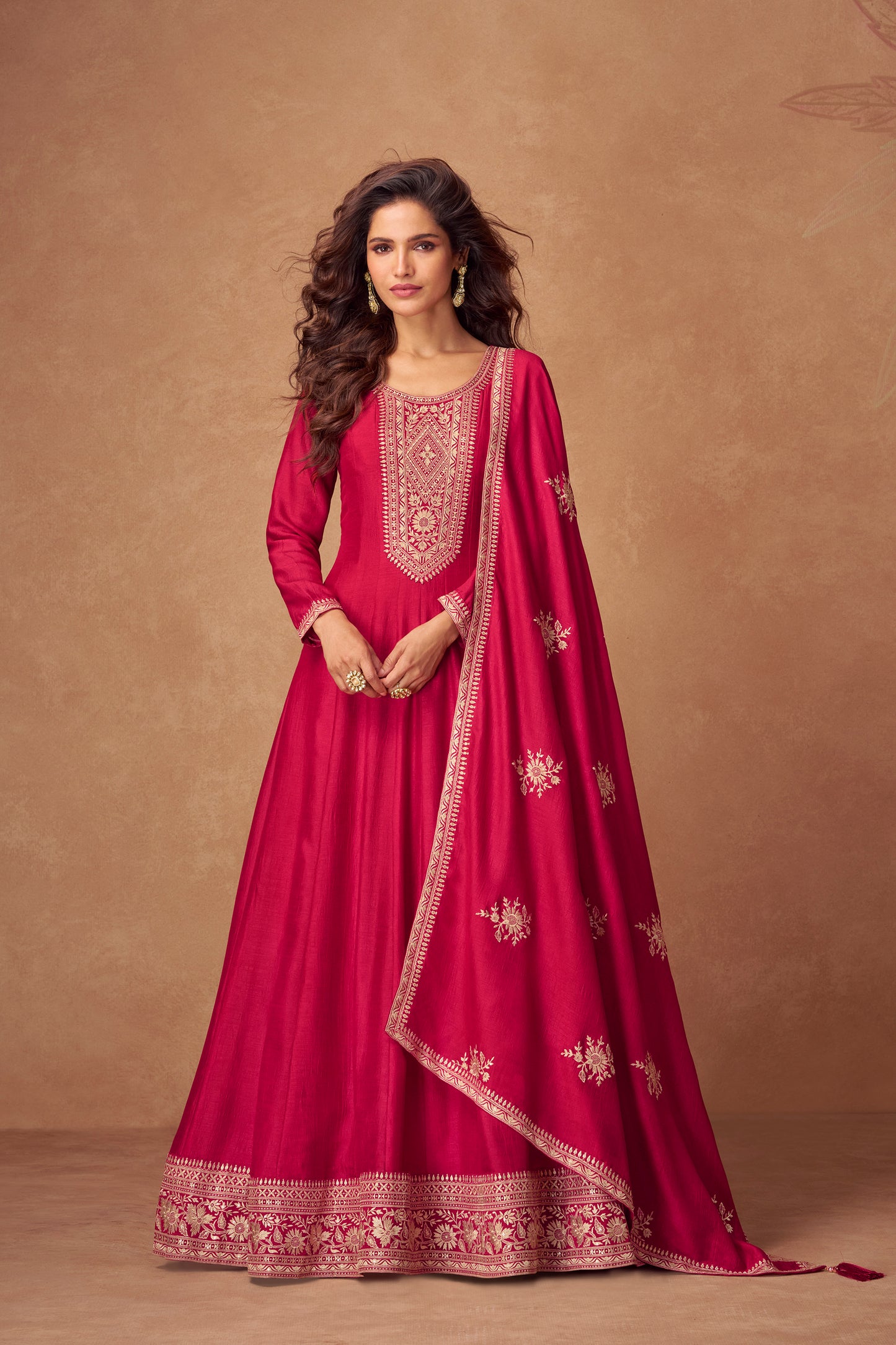 Red color Anarkali gown symbolizes elegance and tradition, perfect for weddings, receptions, and festive celebrations.