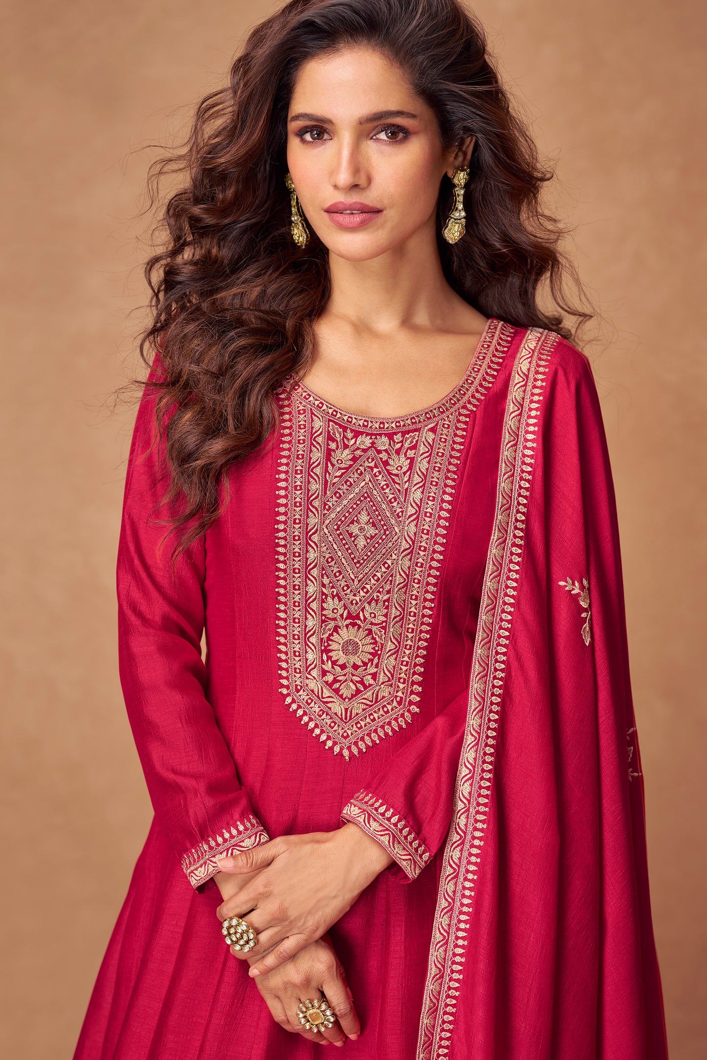 Red color Anarkali gown symbolizes elegance and tradition, perfect for weddings, receptions, and festive celebrations.