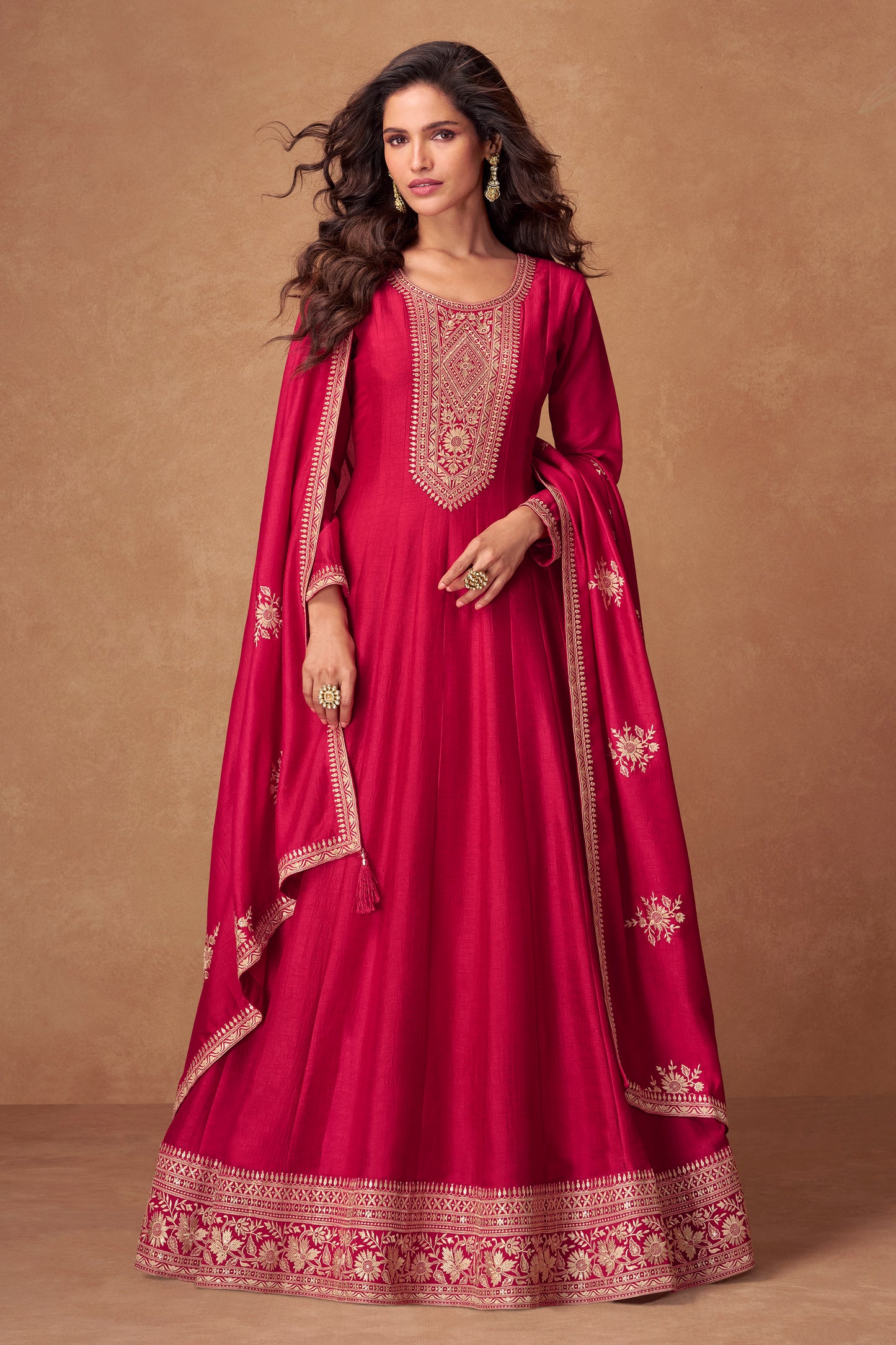 Red color Anarkali gown symbolizes elegance and tradition, perfect for weddings, receptions, and festive celebrations.