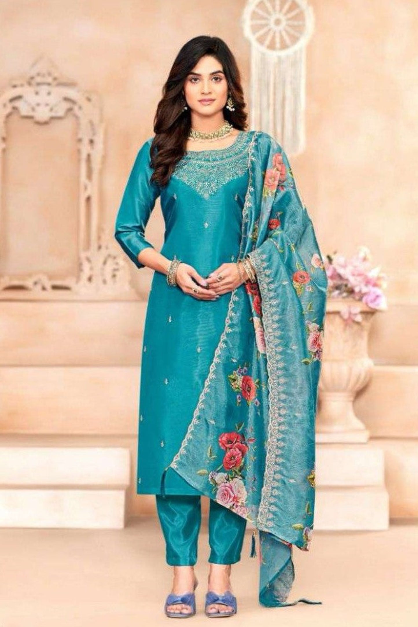 Teal blue cotton outfit with a vibrant yet calming tone—perfect for both everyday elegance and semi-formal occasions.