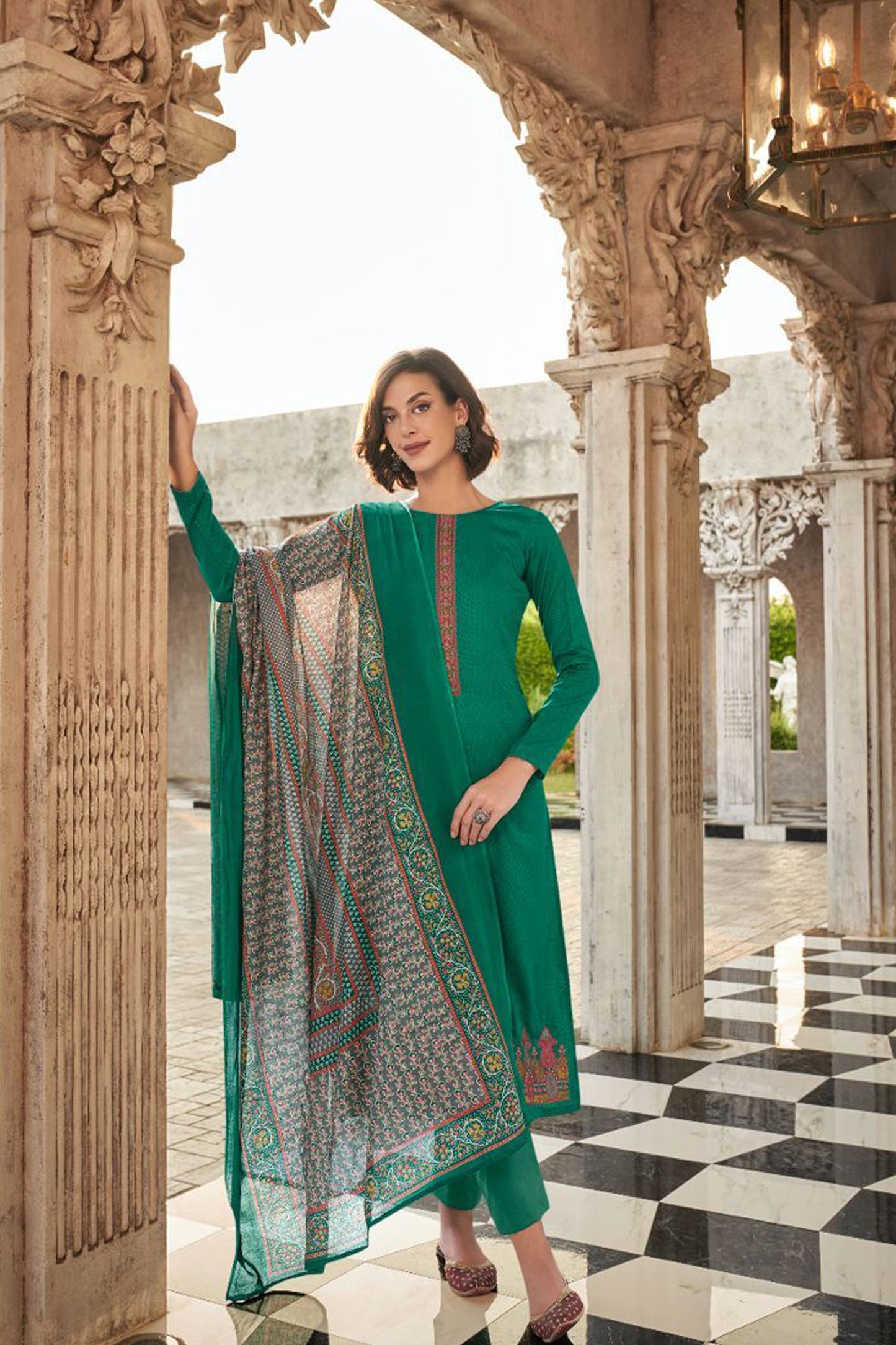 Green colour cotton wear symbolizes freshness and festivity – great for Mehndi or family gatherings.
