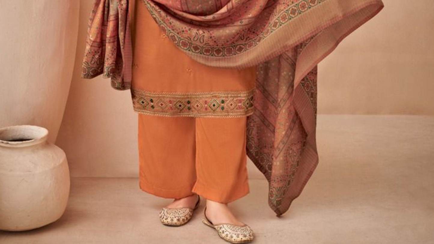 Orange designer rayon fabric salwar kameez with silk dupatta