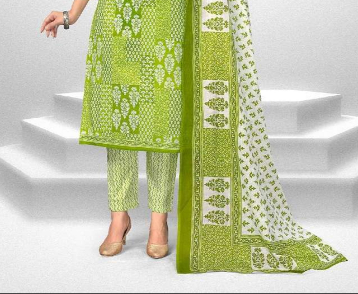 Green colour cotton wear symbolizes freshness and festivity – great for Mehndi or family gatherings.