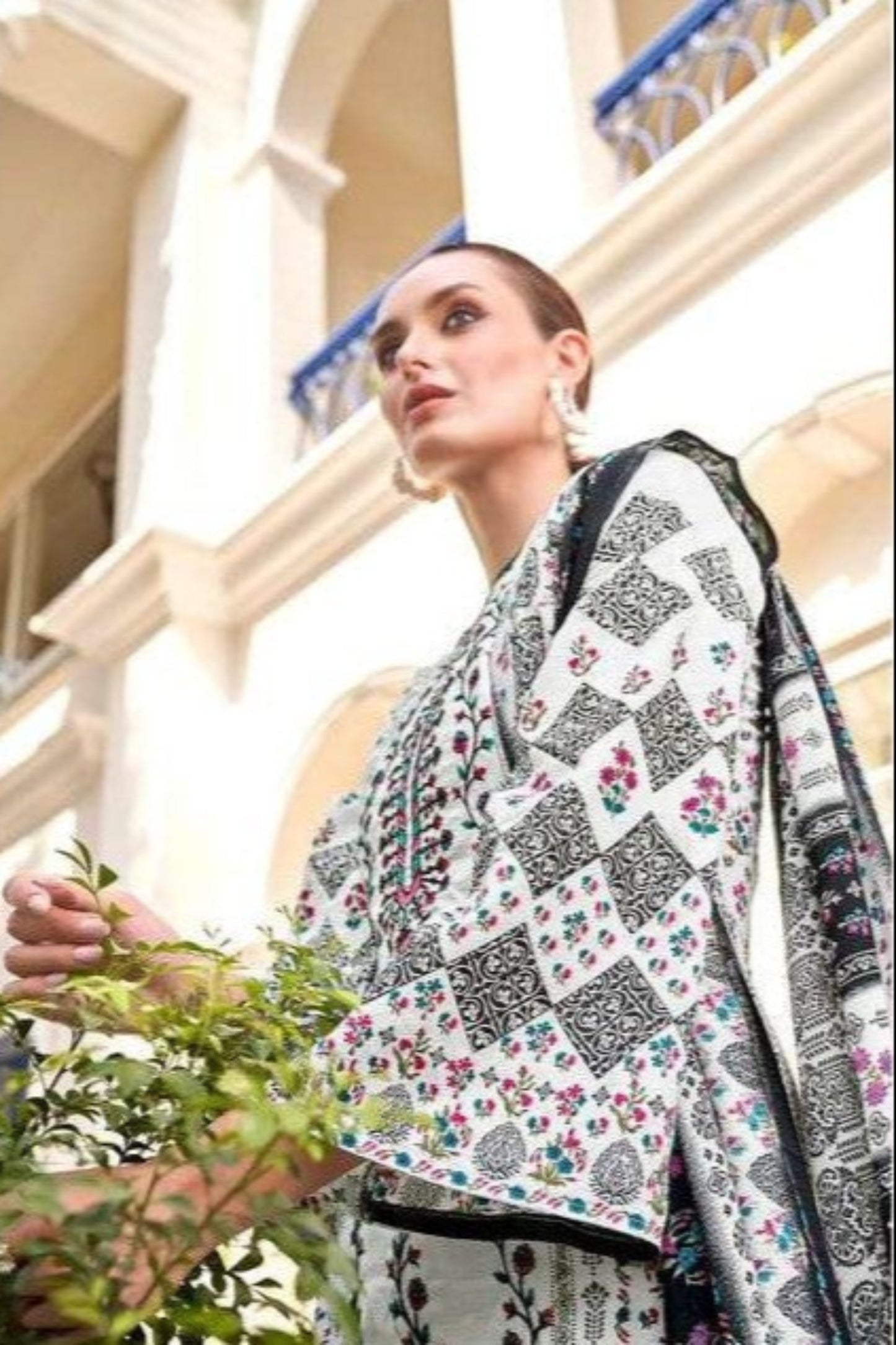 Elegant white cotton outfit with a soft, breathable feel, ideal for casual days, festive mornings, and warm-weather occasions.