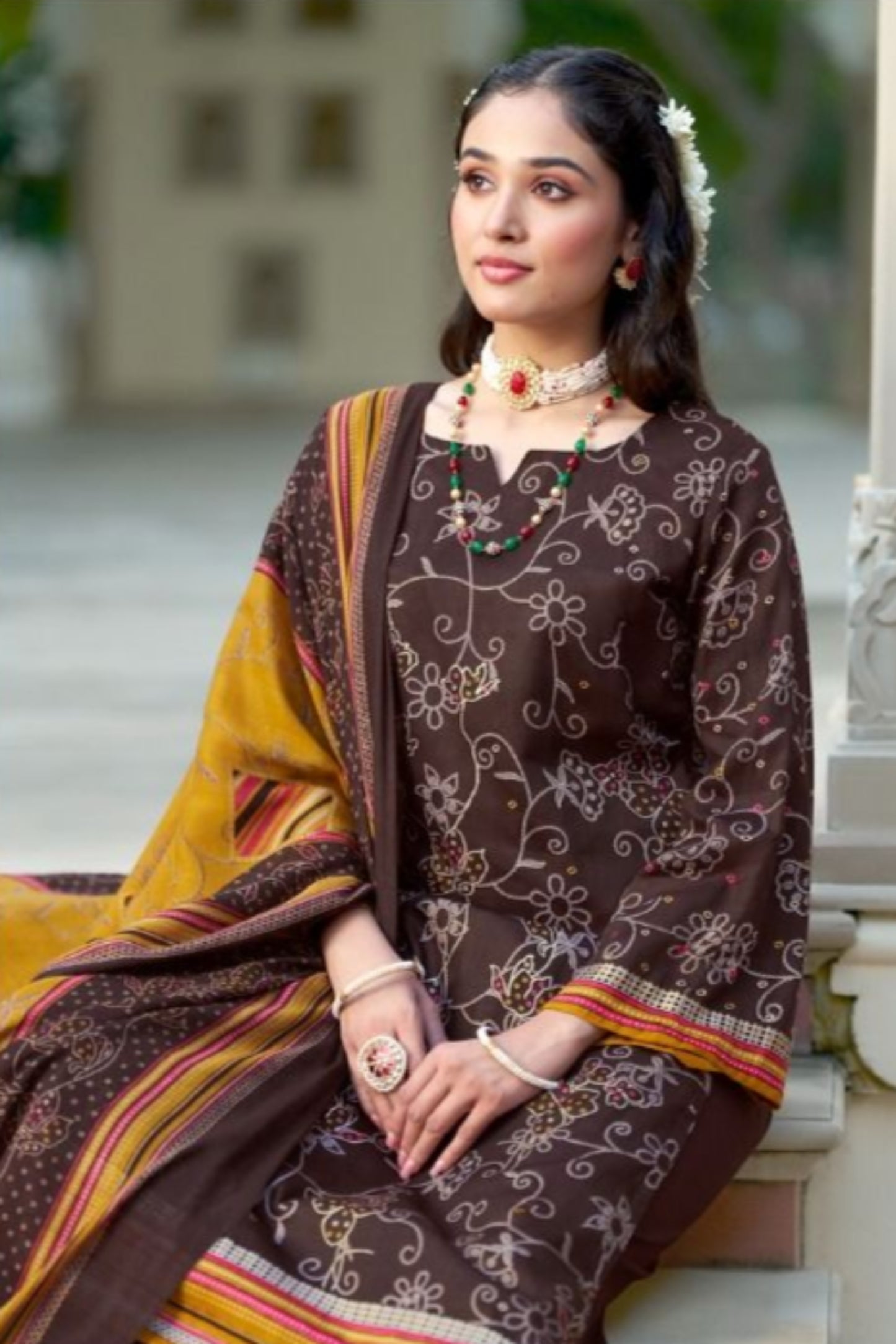 Dark brown salwar kameez exudes a rich, earthy charm that’s perfect for both formal events and elegant everyday wear.