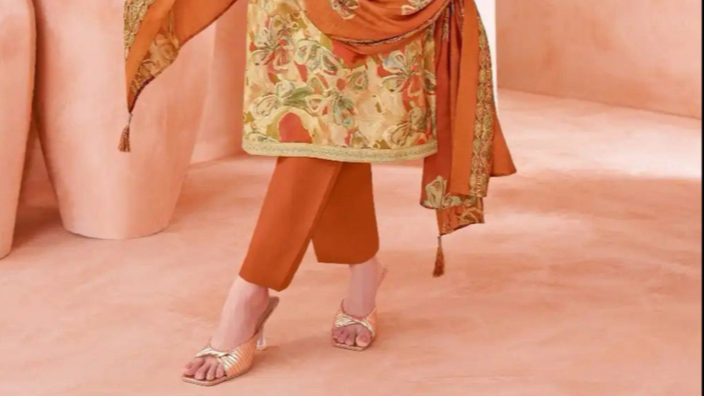 Dark orange cotton outfit with a bold and festive look, perfect for cultural events, traditional functions, and bright daytime wear.