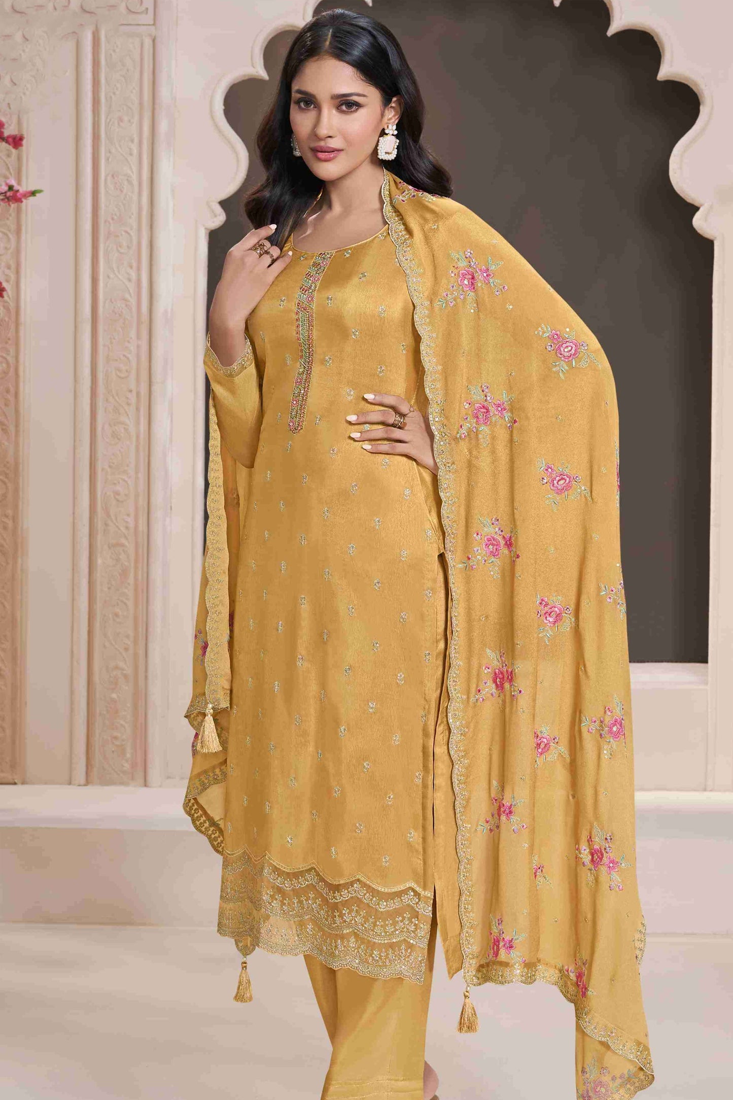 Yellow salwar kameez is bright and happy. Good for haldi or sunny events.