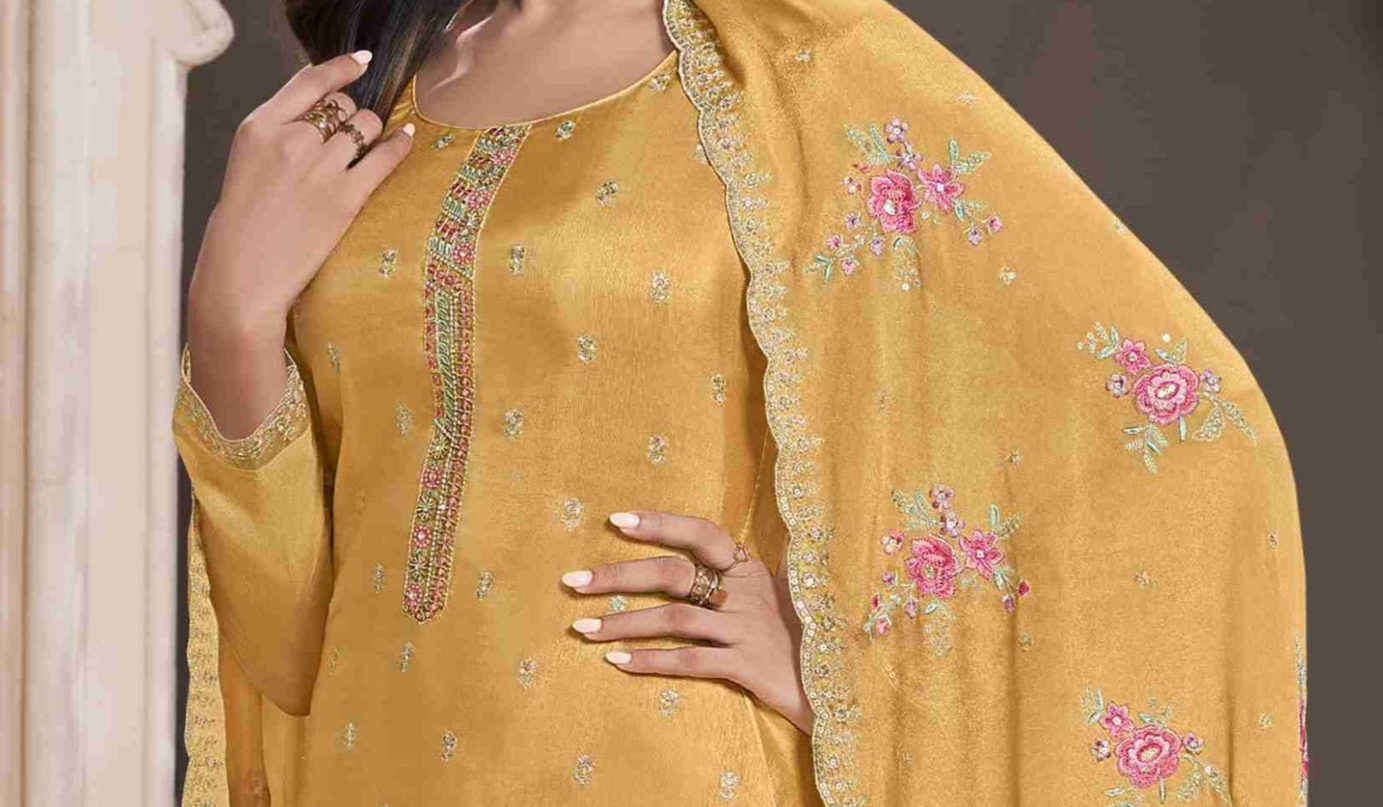 Yellow salwar kameez is bright and happy. Good for haldi or sunny events.