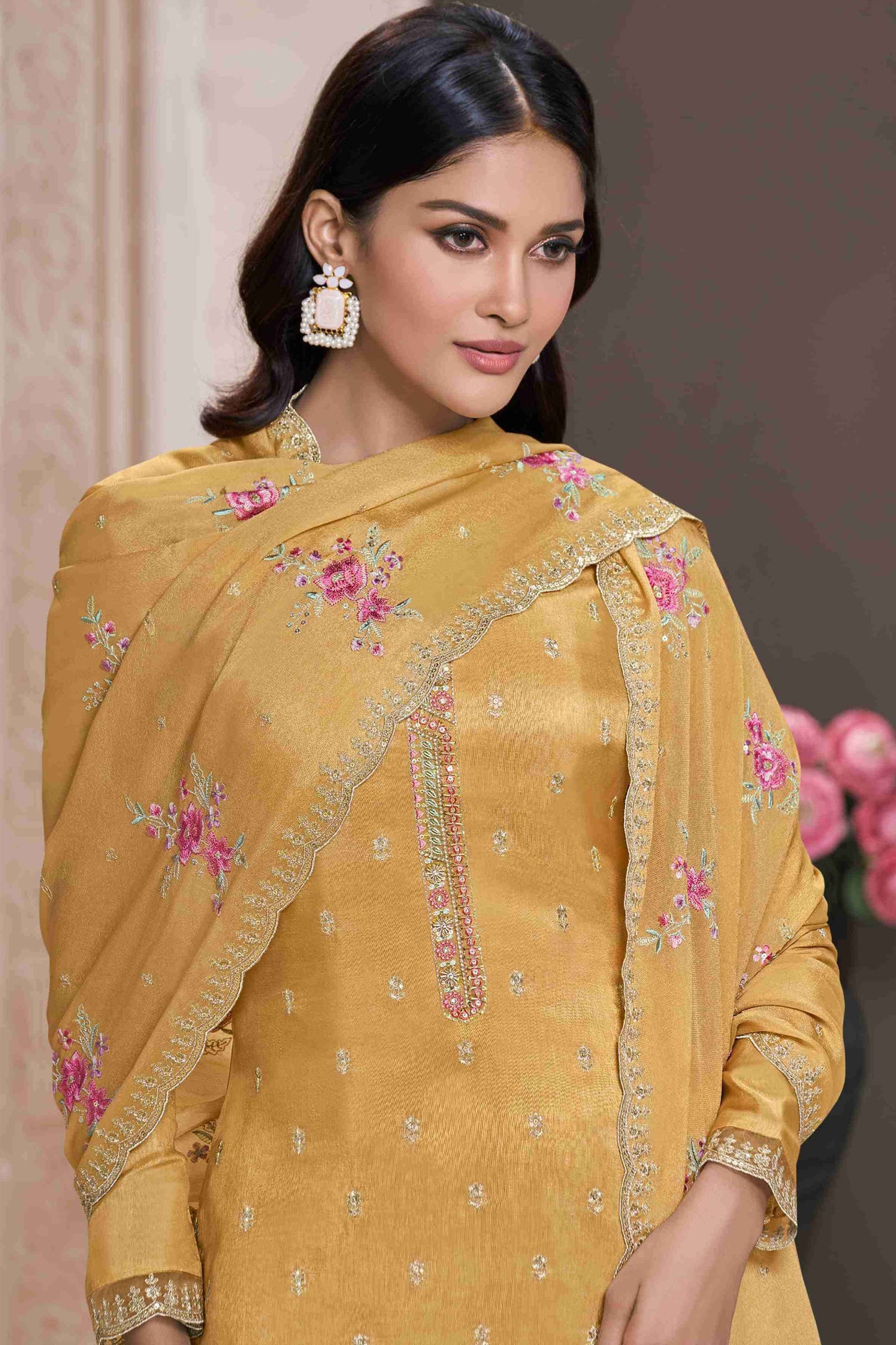 Yellow salwar kameez is bright and happy. Good for haldi or sunny events.