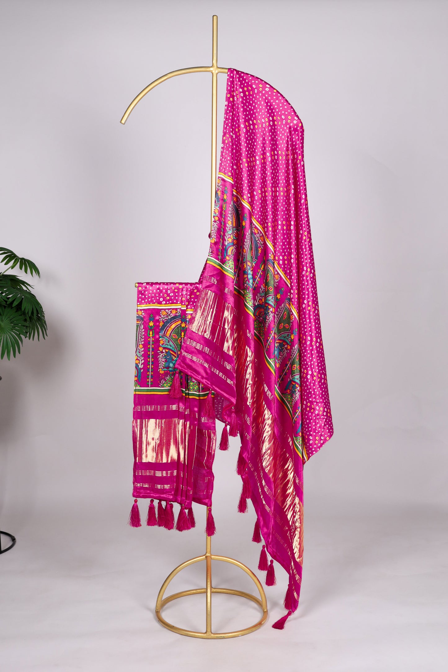 Dark pink color Gaji silk fabric with printed dupatta, showcasing bold and intricate patterns that enhance the festive appeal of your salwar kameez ensemble.