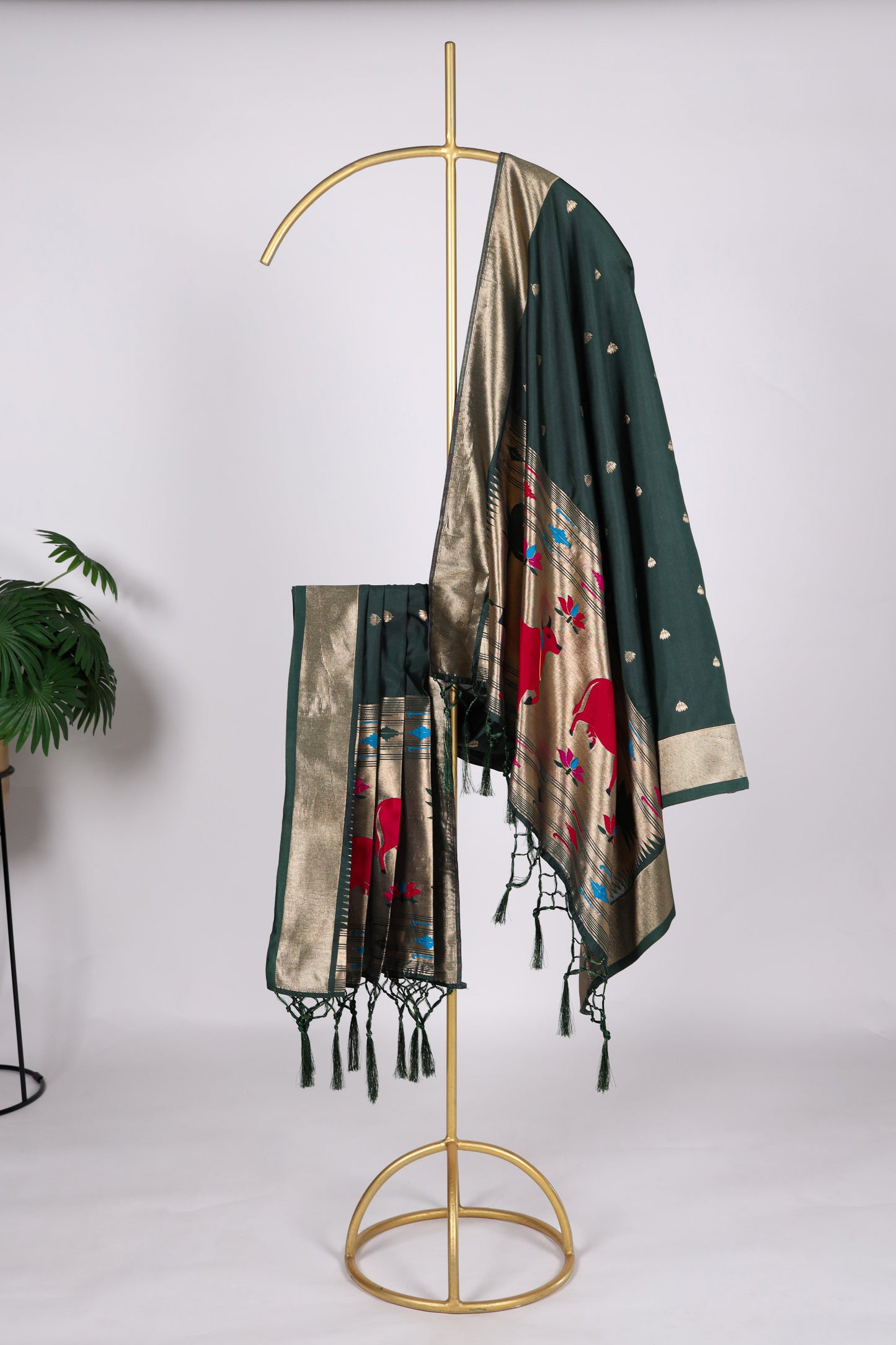 Dark green color Gaji silk fabric with printed dupatta, adorned with intricate traditional motifs that enhance the richness and festive elegance of your salwar kameez outfit.