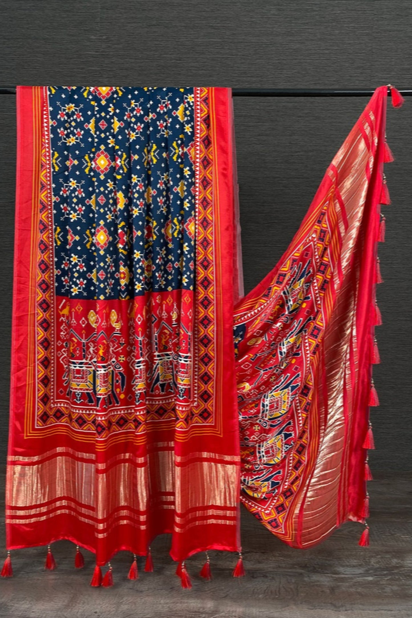Red georgette dupatta with golden lace border, ideal for weddings and traditional celebrations.