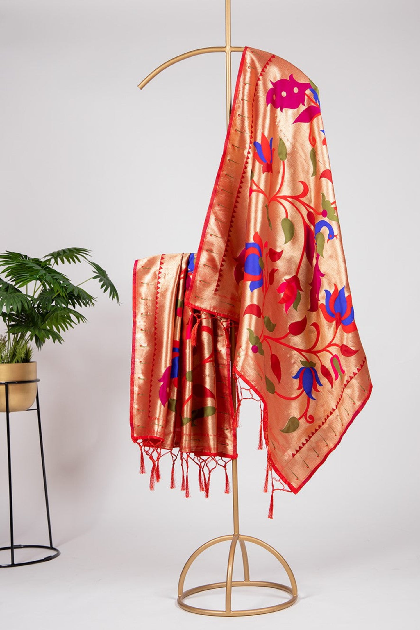 Orange color Gaji silk fabric with printed dupatta, embellished with vibrant traditional motifs that add a festive and energetic flair to your salwar kameez ensemble.
