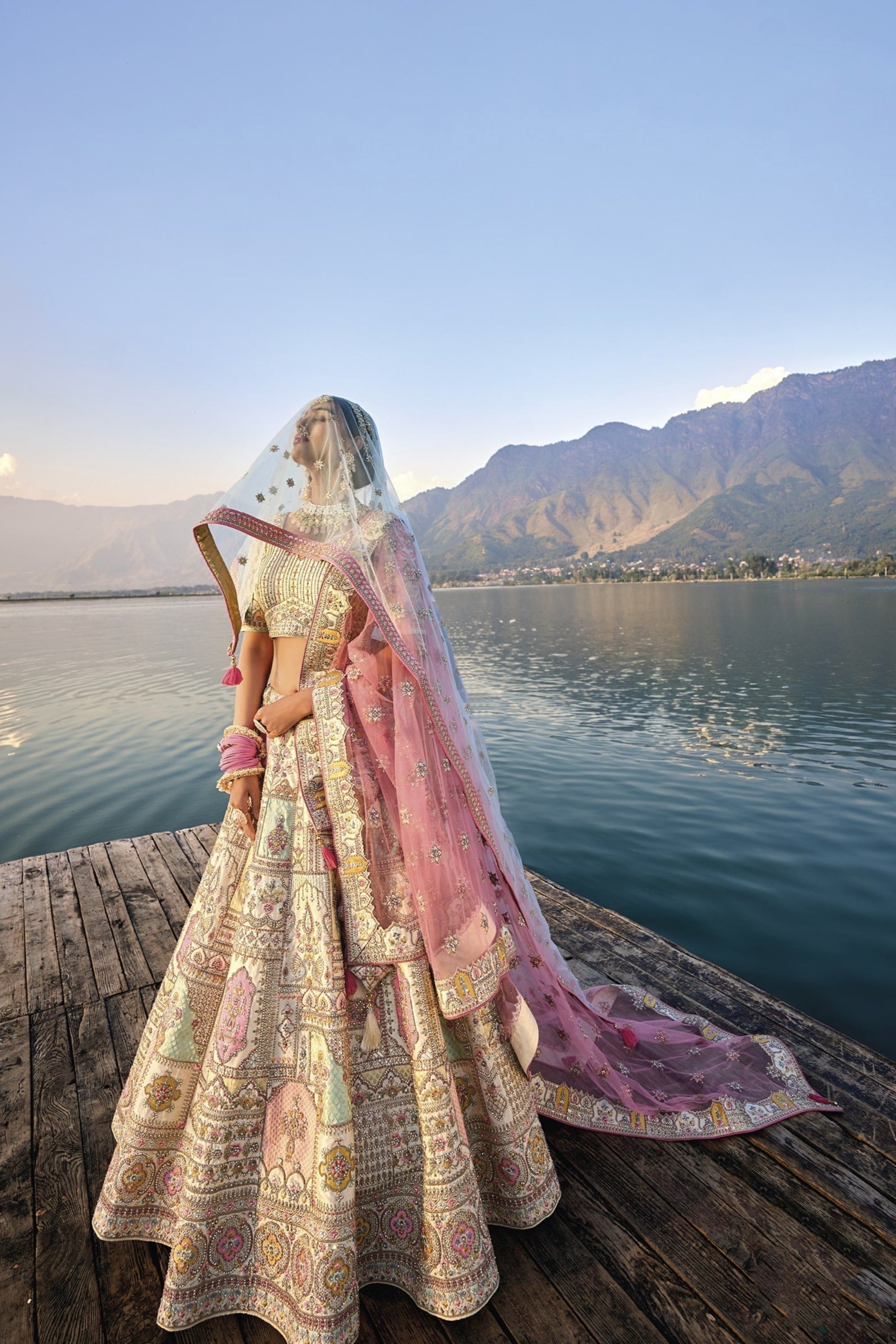 "Ivory Elegance: Minimalist Bridal Lehenga with Crystal Detailing"