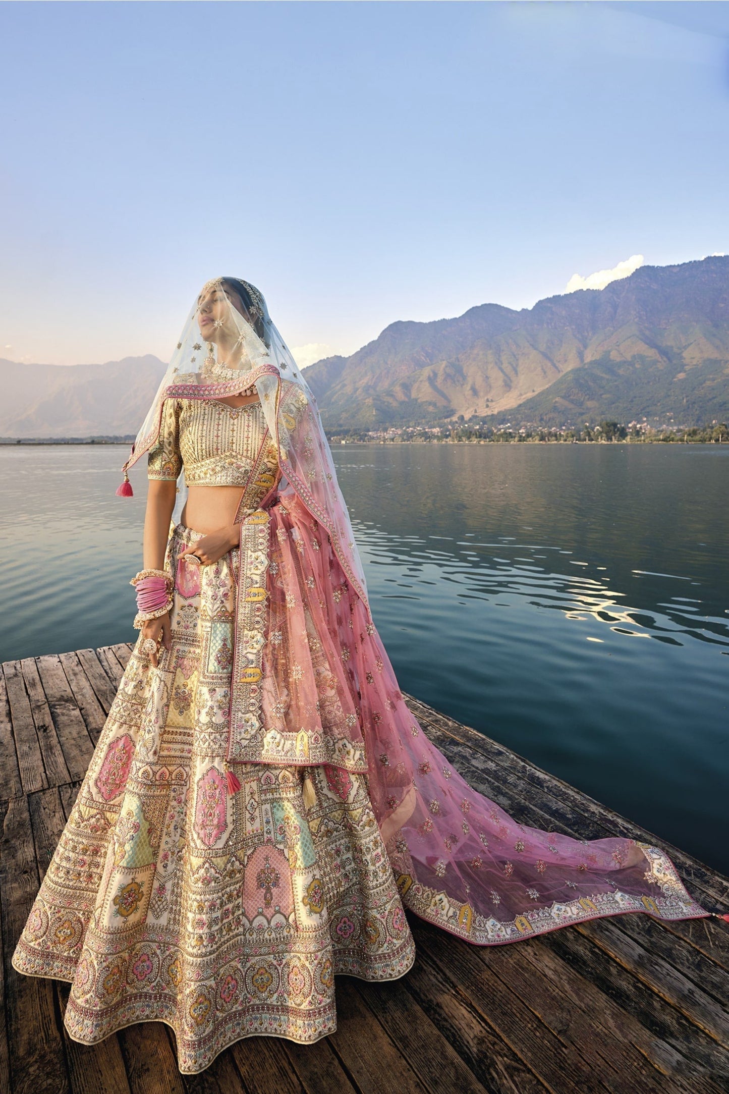 "Ivory Elegance: Minimalist Bridal Lehenga with Crystal Detailing"