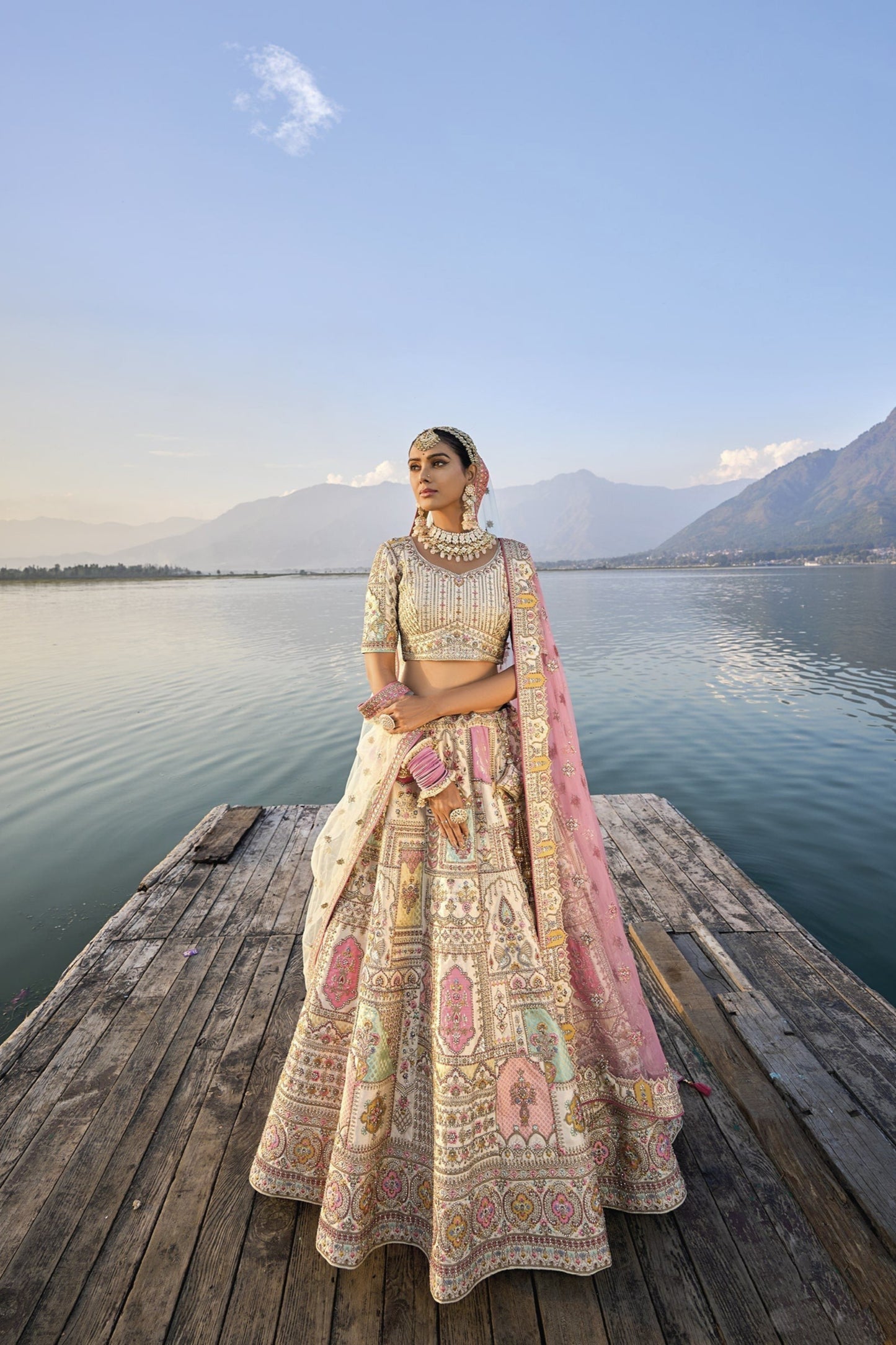 "Ivory Elegance: Minimalist Bridal Lehenga with Crystal Detailing"