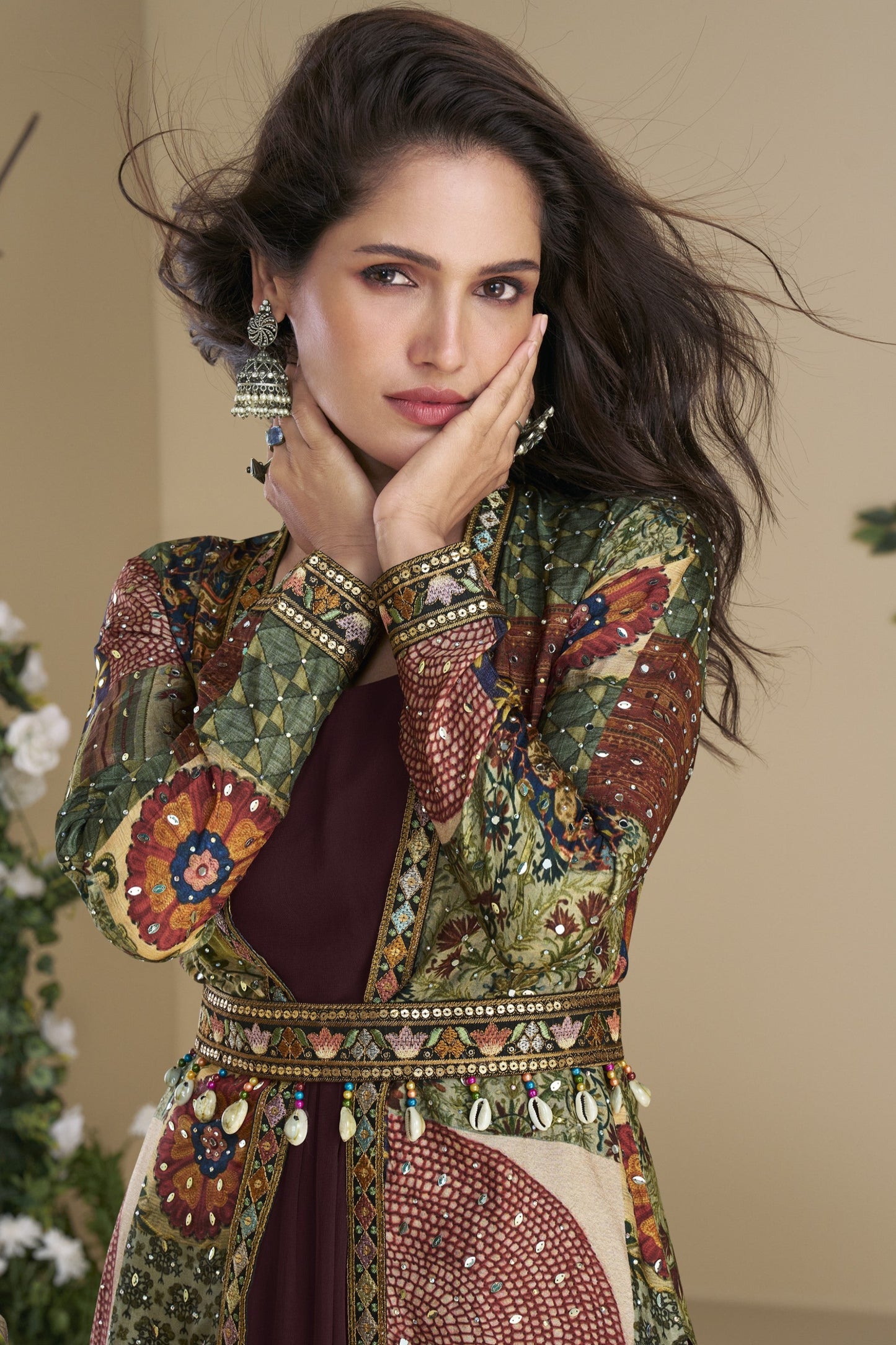 Dark brown Indo-Western Anarkali gown in silk fabric with embellished work, perfect for festive elegance.
