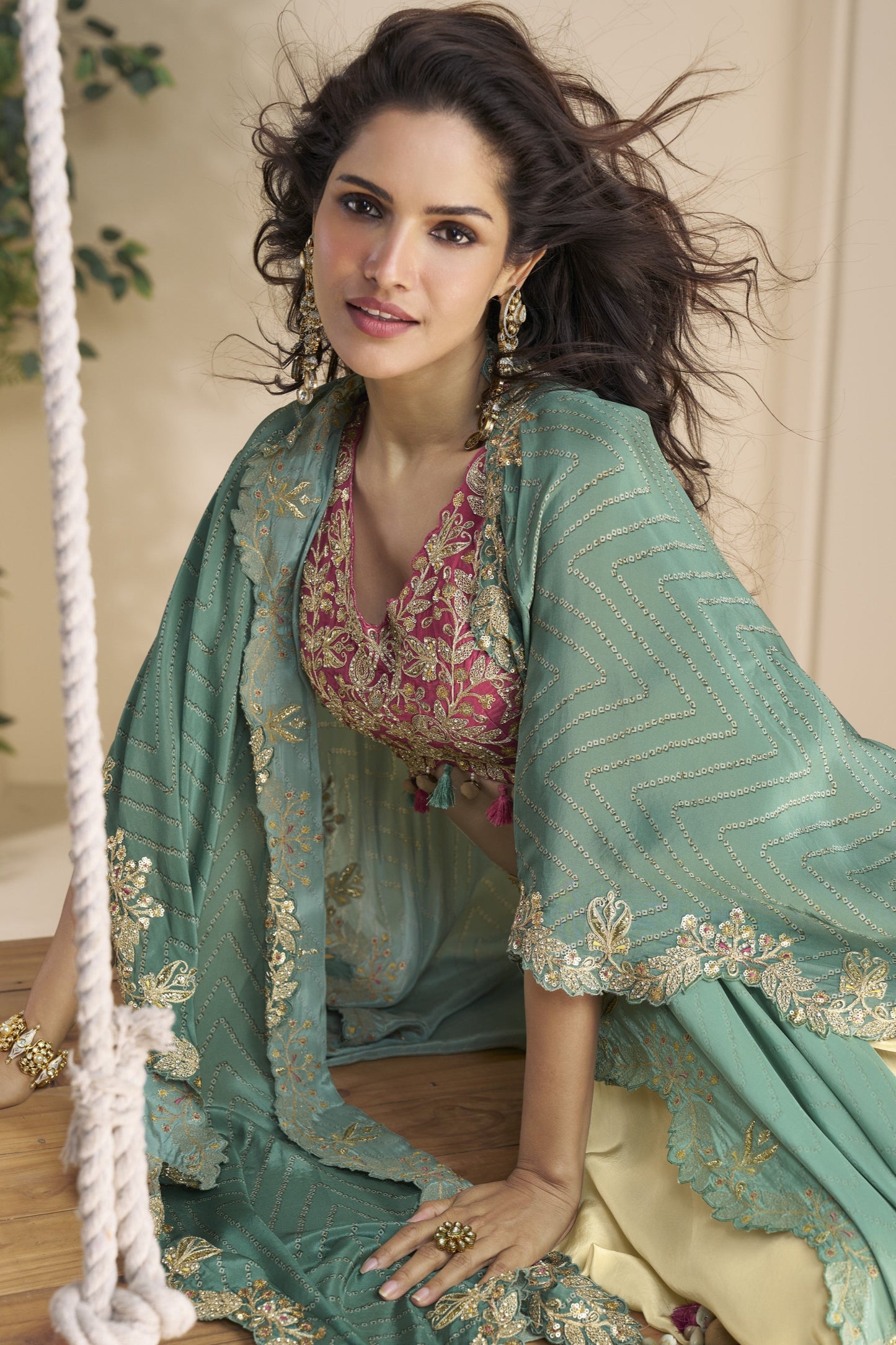 Beige color lehenga in Chinon silk fabric with embroidery and embellished work, offering a graceful and elegant look perfect for weddings and festive occasions.