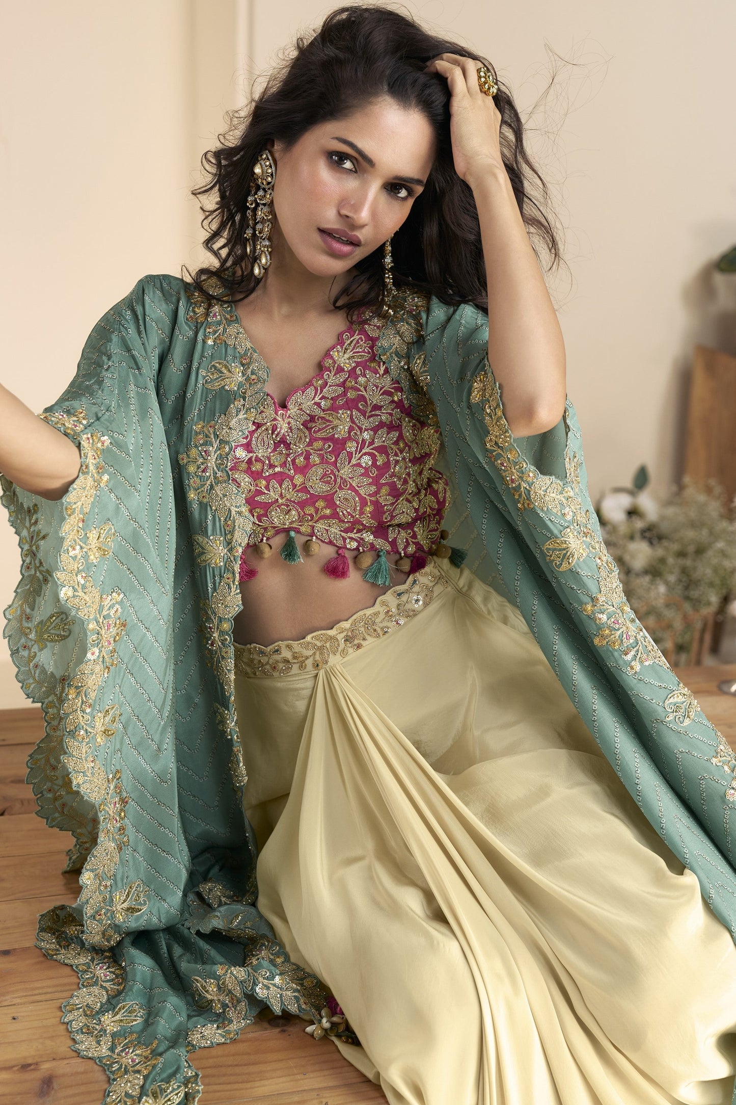 Beige color lehenga in Chinon silk fabric with embroidery and embellished work, offering a graceful and elegant look perfect for weddings and festive occasions.