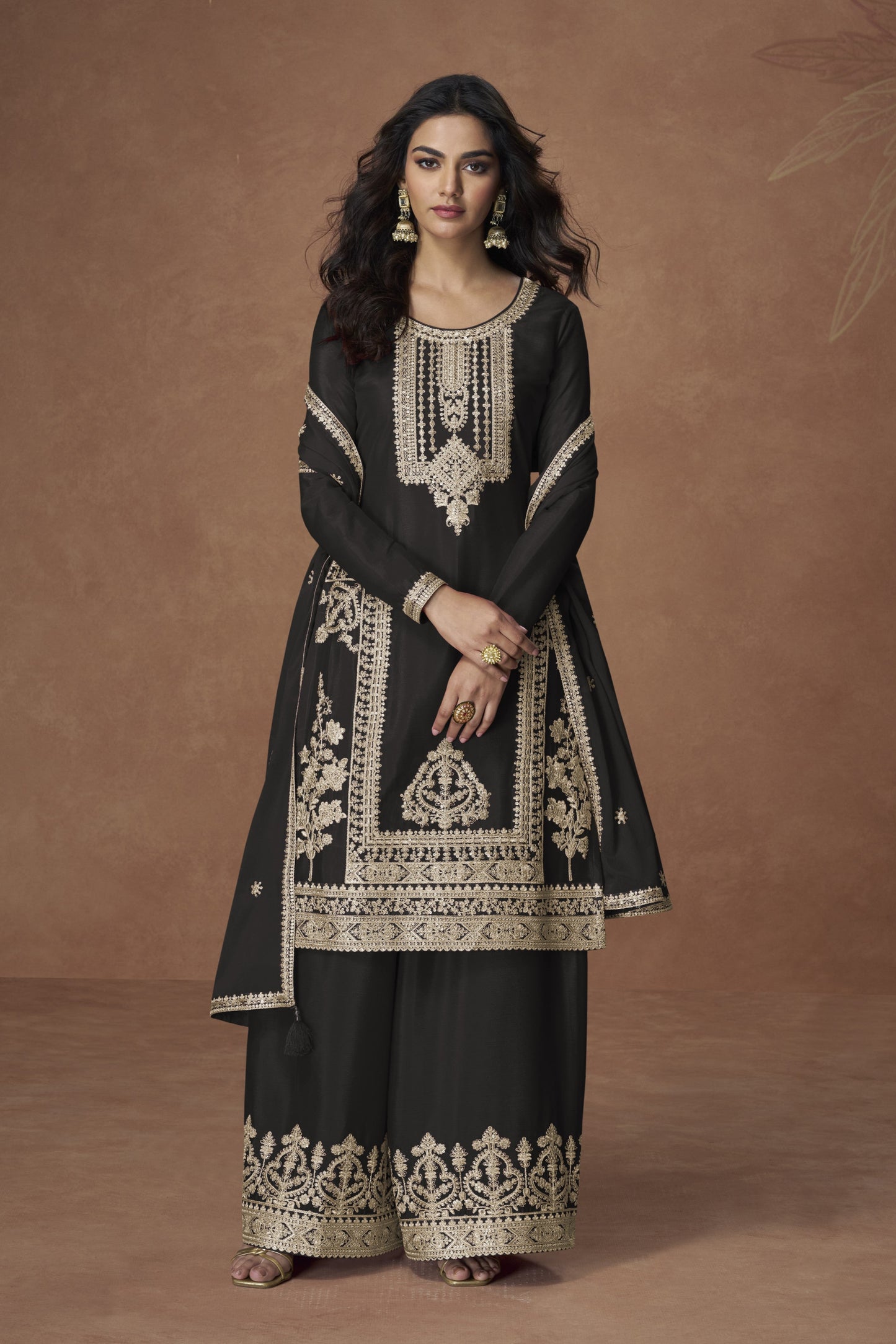 Black color palazzo suit with embroidery work, featuring timeless elegance and classic charm perfect for festive and evening occasions.