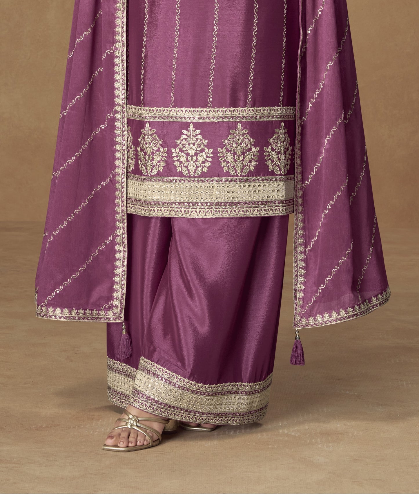 Dark pink color palazzo suit with embroidery work, offering a bold and vibrant look ideal for festive and special occasions.