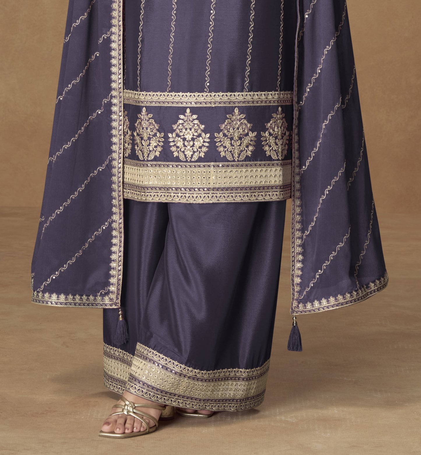 Navy blue color palazzo suit with embroidery work, showcasing a deep and elegant style perfect for festive gatherings and traditional events.