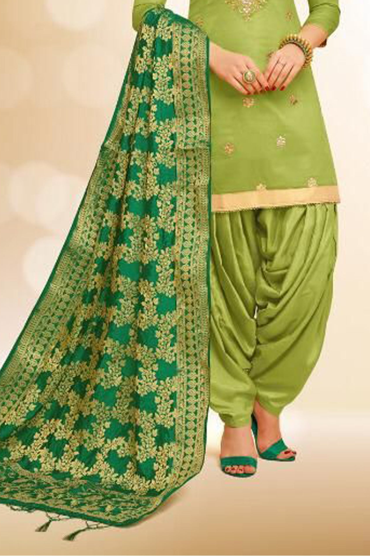 Green Patiala symbolizes freshness and festivity – great for Mehndi or family gatherings.