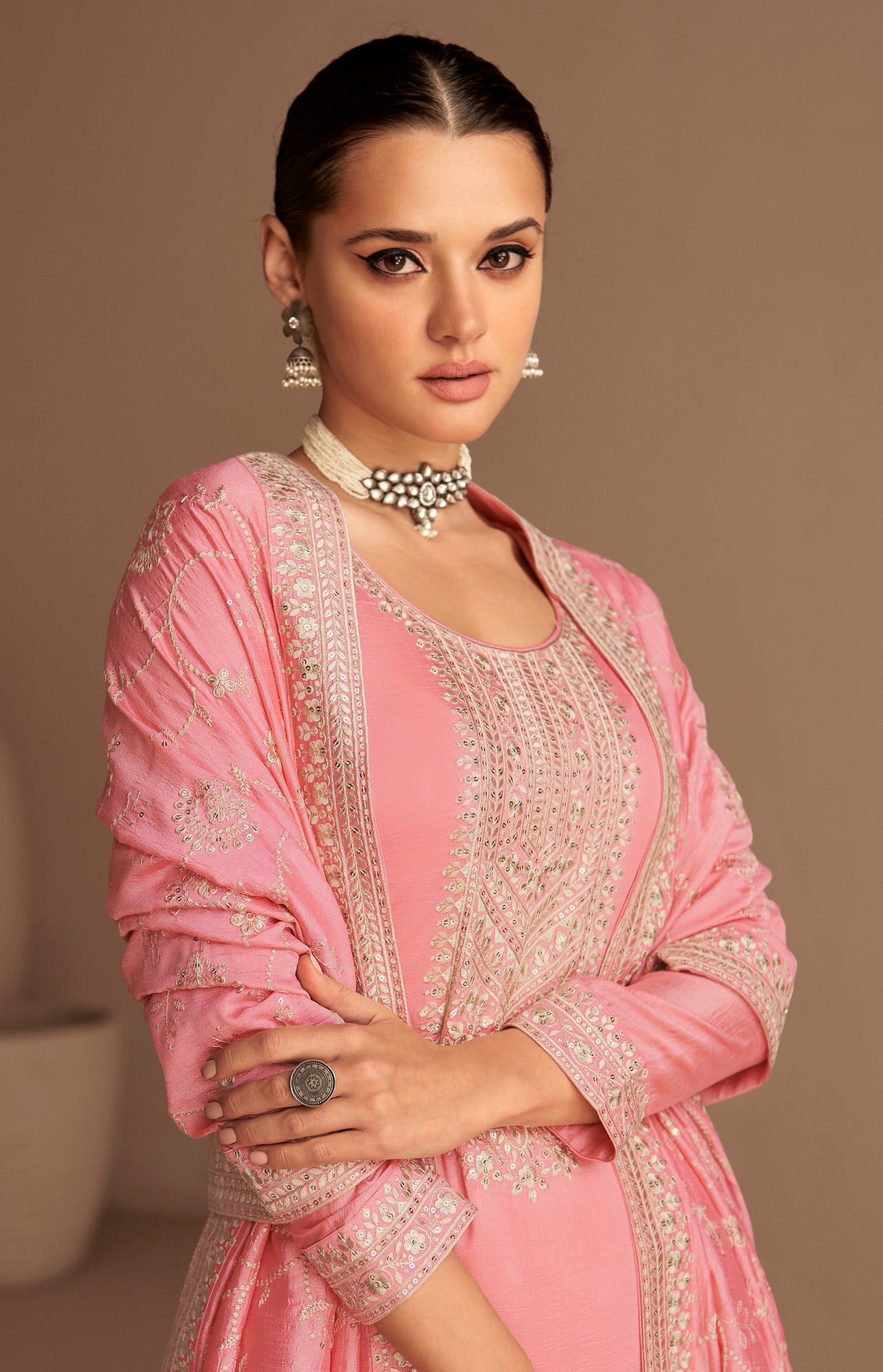 Pink salwar kameez is cheerful and lovely. Perfect for celebrations.