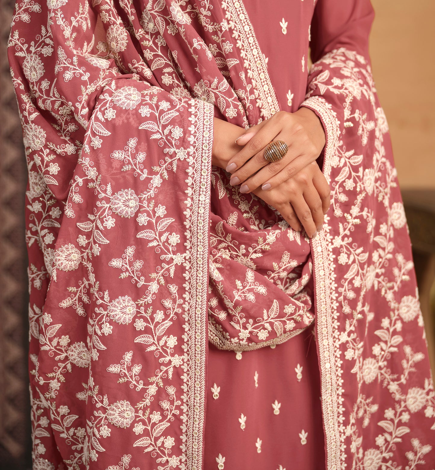 Peach salwar kameez brings soft elegance and warmth, perfect for daytime celebrations and festive charm.