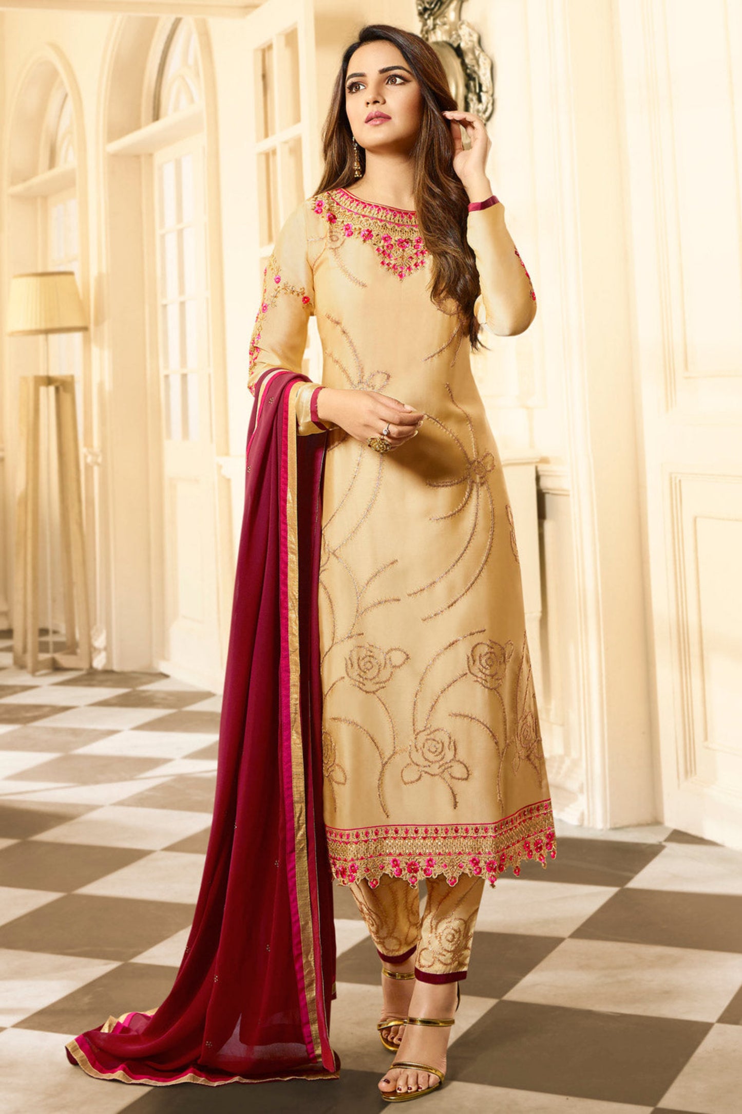 Gold salwar kameez looks royal and festive. Great for parties and celebrations.