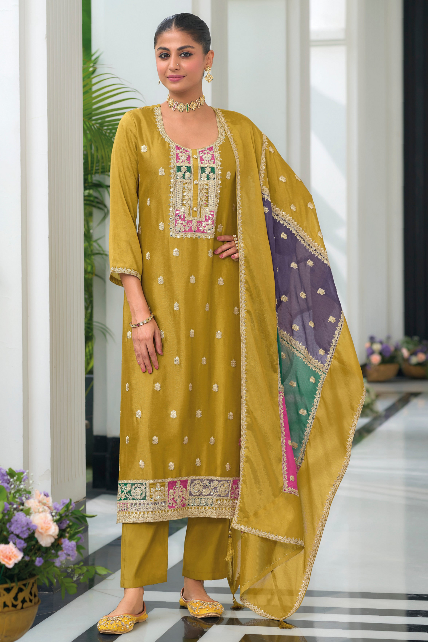 Yellow salwar kameez is bright and happy. Good for haldi or sunny events.