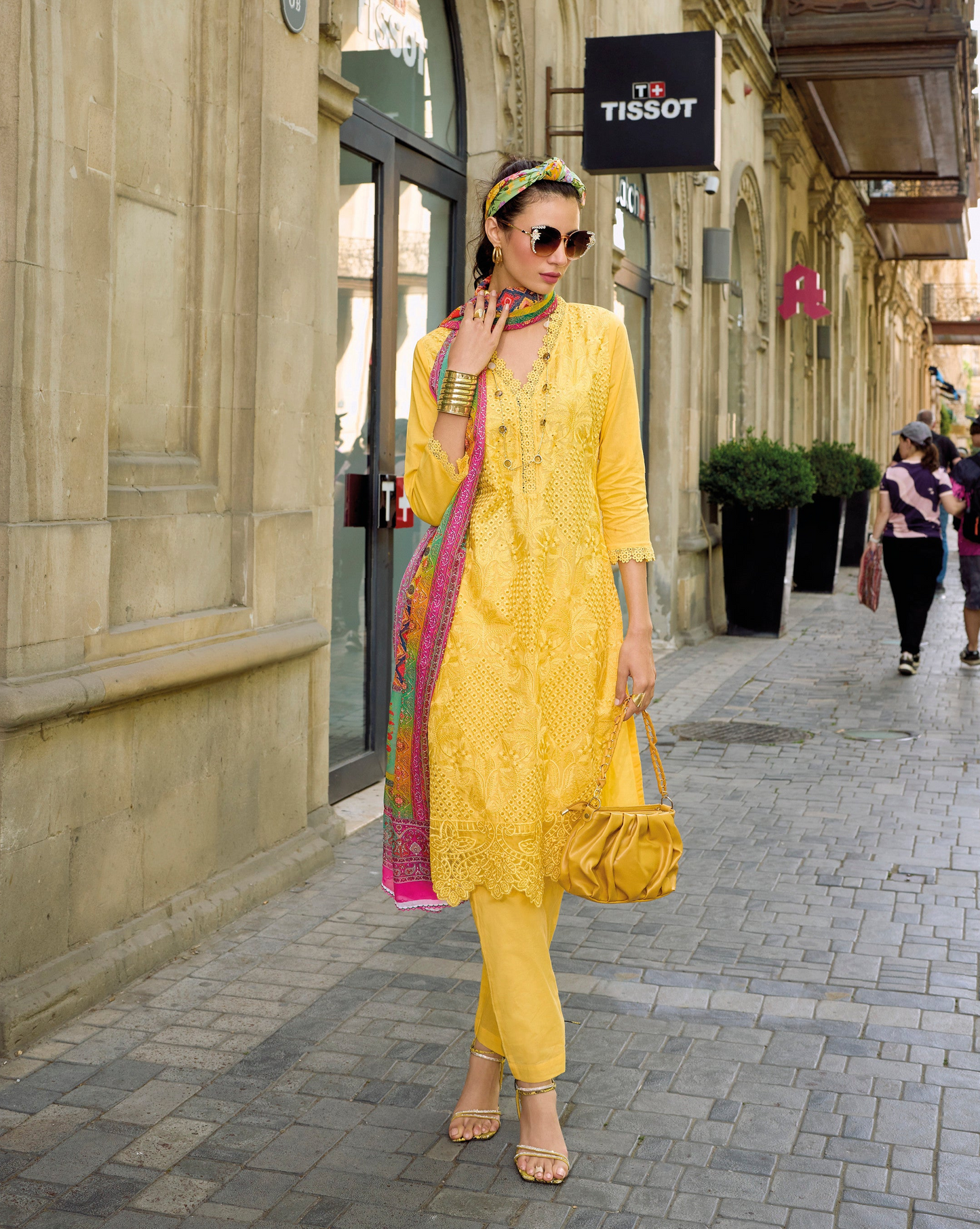Yellow salwar kameez is bright and happy. Good for haldi or sunny events.