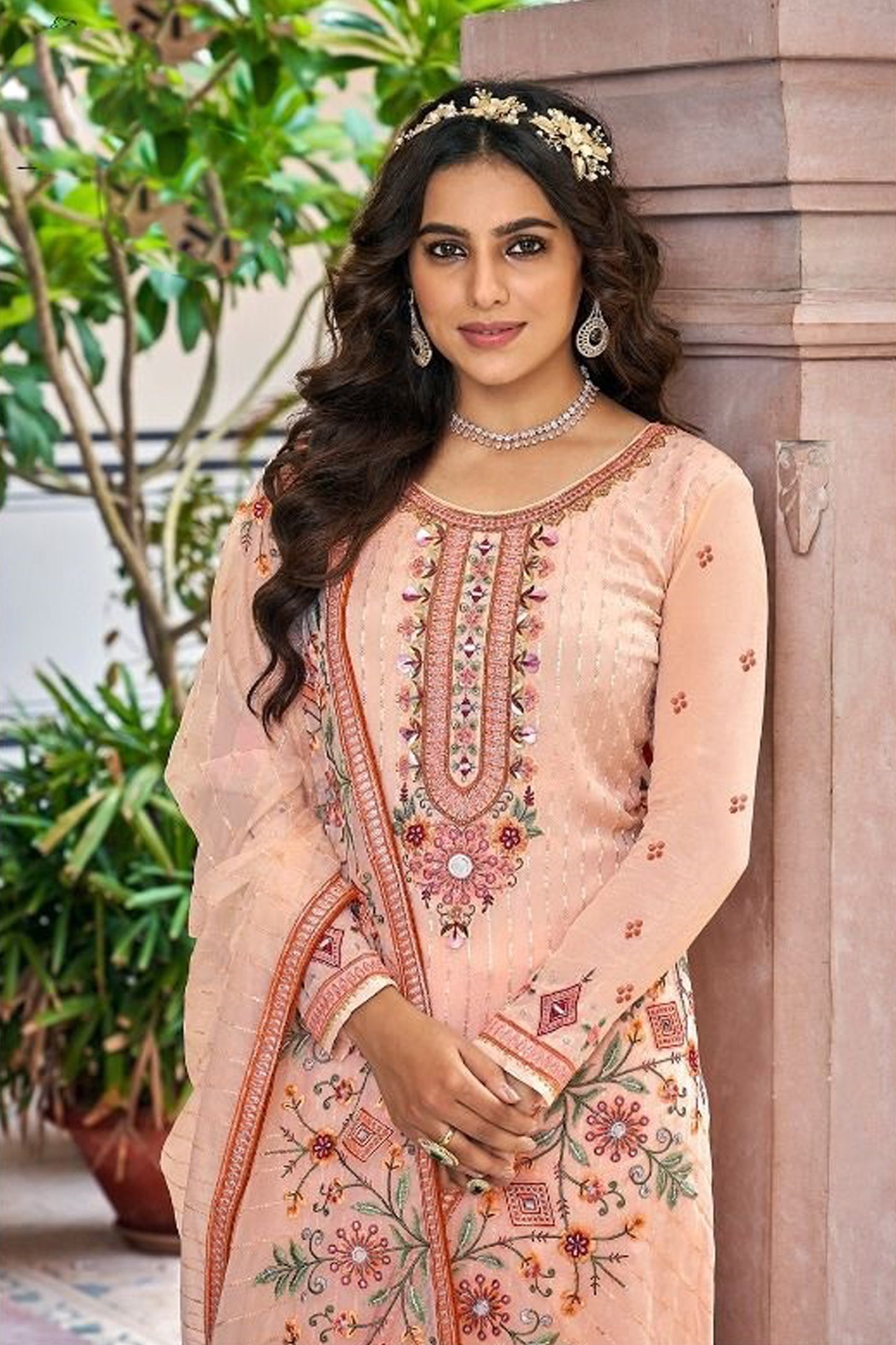 Pink salwar kameez is cheerful and lovely. Perfect for celebrations.