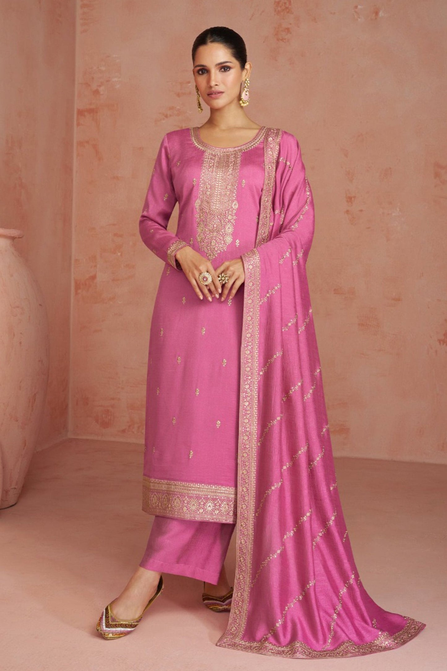 Pink salwar kameez is cheerful and lovely. Perfect for celebrations.
