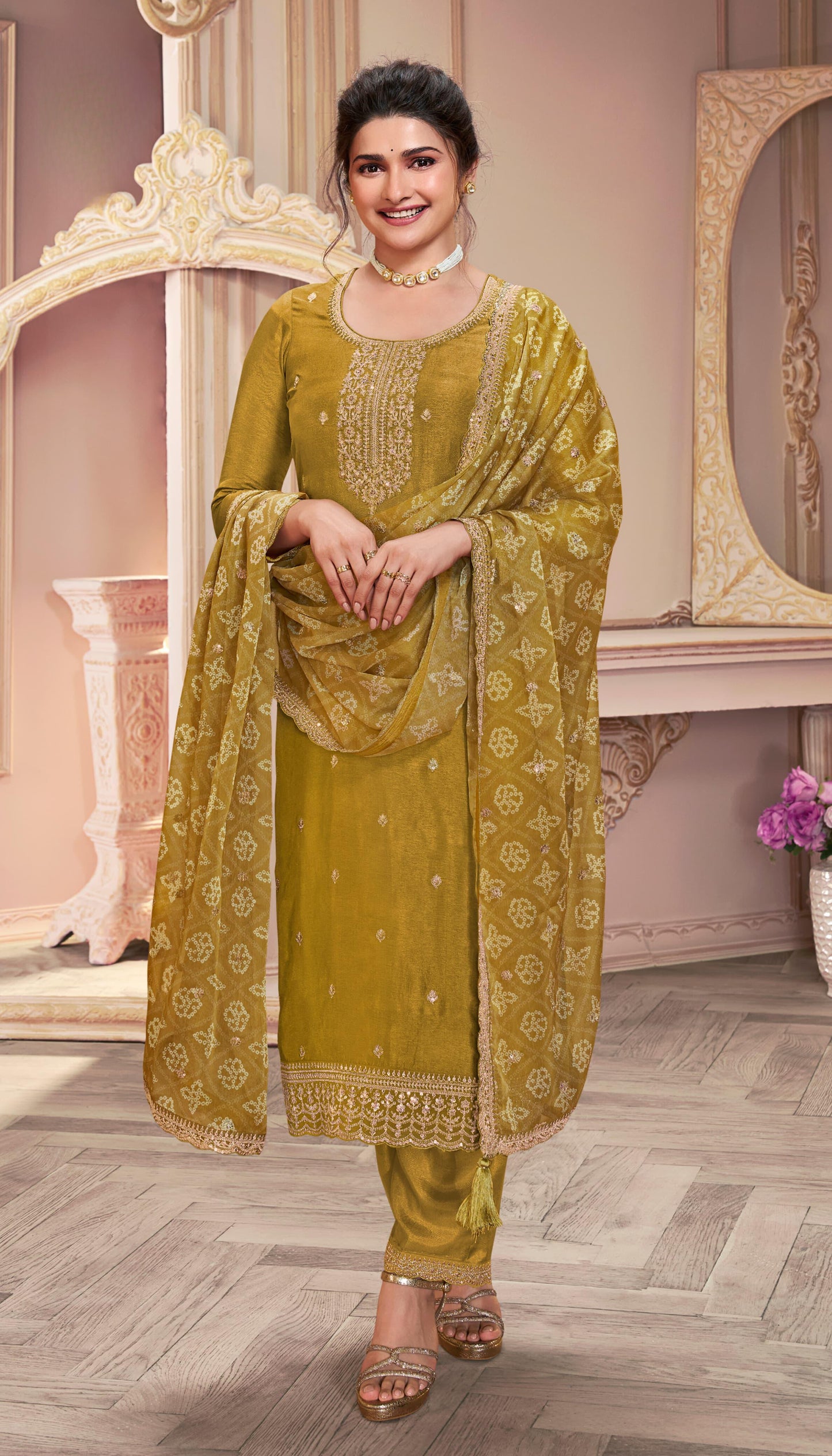 Yellow salwar kameez is bright and happy. Good for haldi or sunny events.