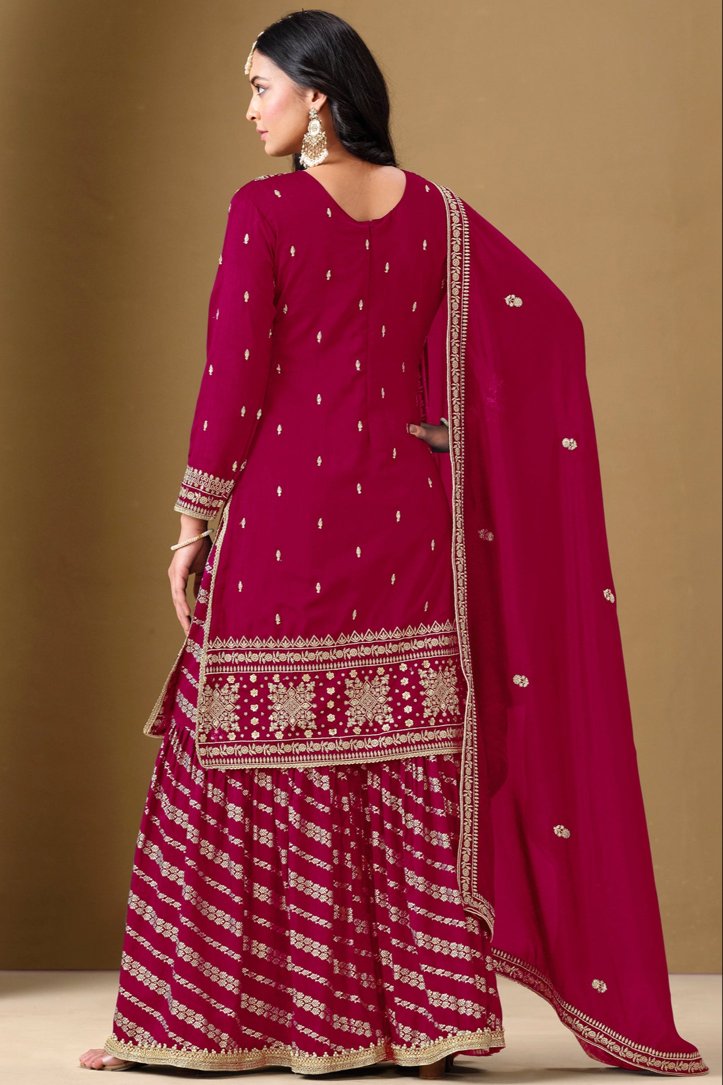 A wine-colored salwar kameez exudes elegance and sophistication